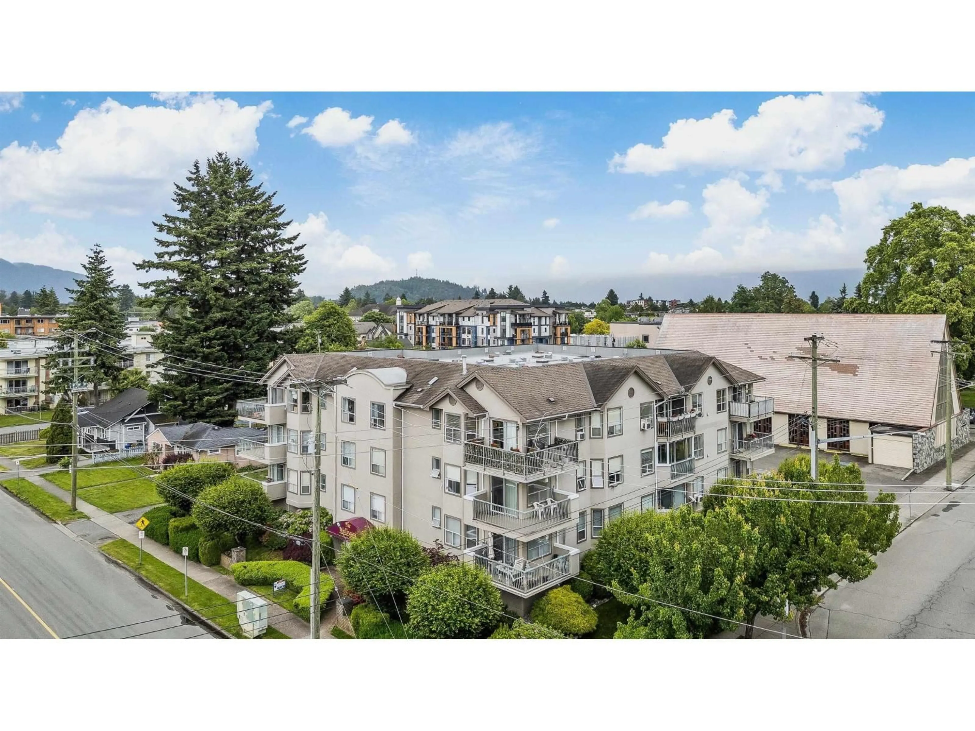 A pic from outside/outdoor area/front of a property/back of a property/a pic from drone, mountain view for 303 - 9400 COOK STREET, Chilliwack British Columbia V2P4J6