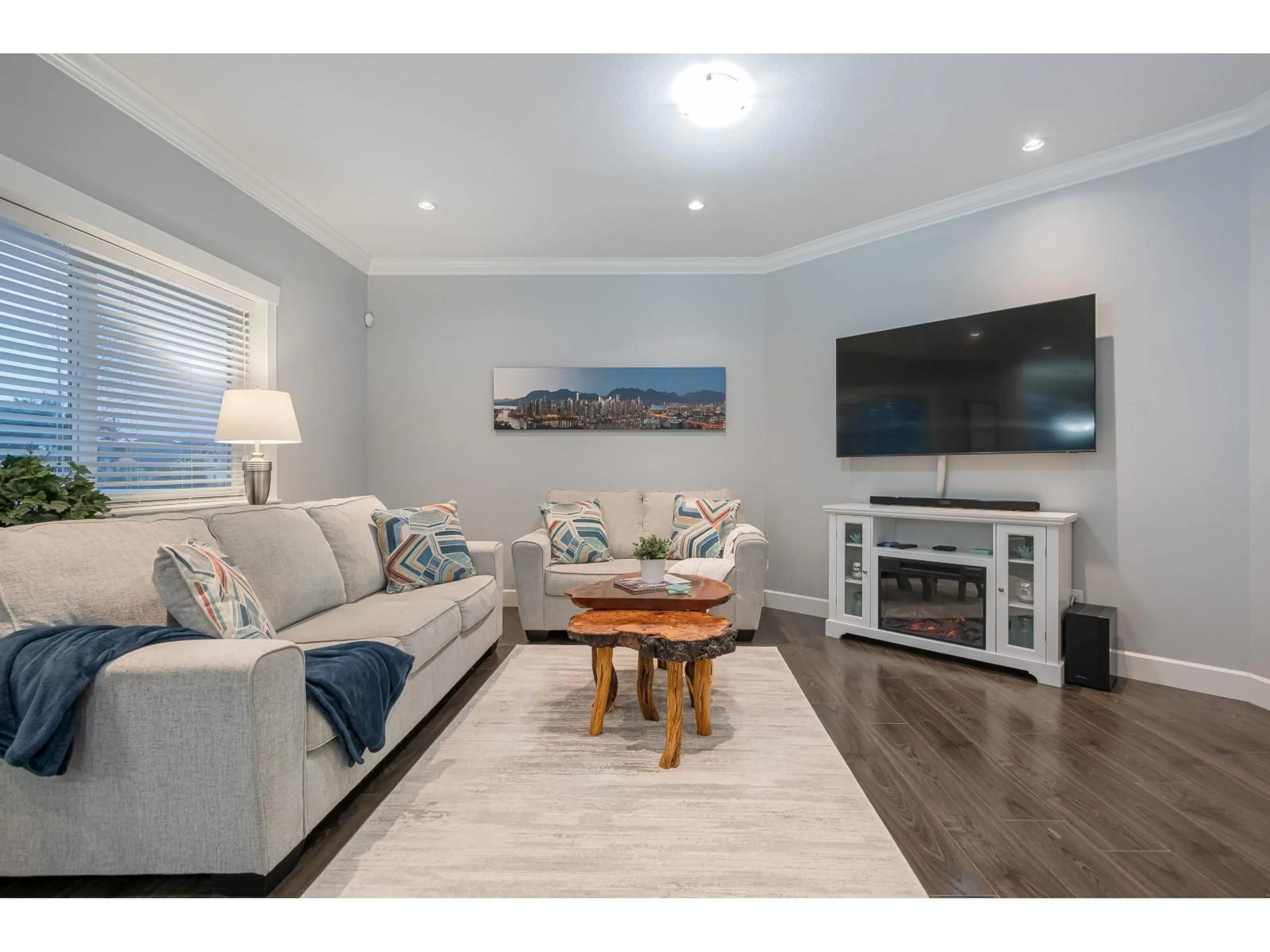 Living room with furniture, wood/laminate floor for 2 - 20256 98A AVENUE, Langley British Columbia V1M3E3