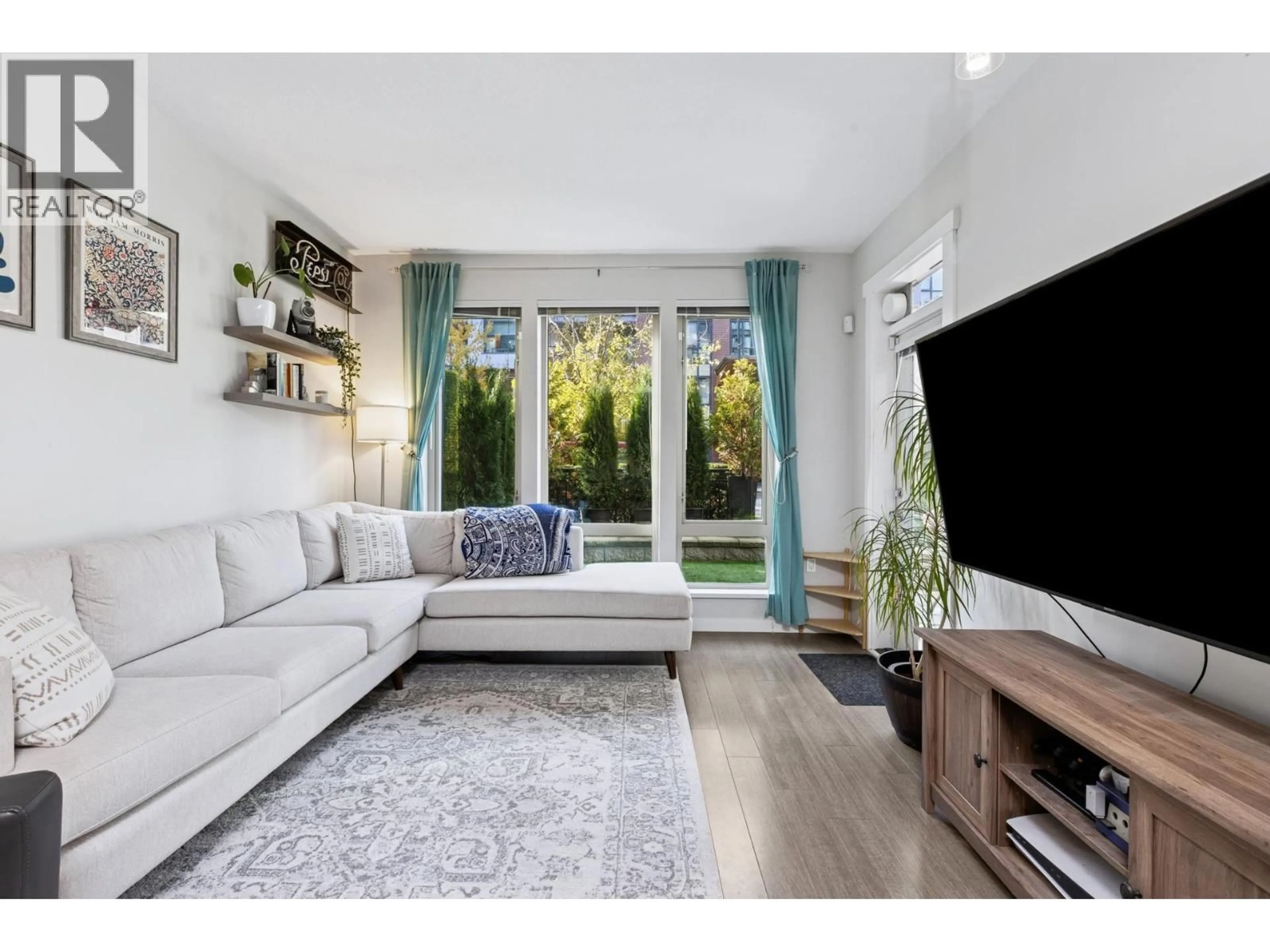 Living room with furniture, unknown for 106 - 2632 LIBRARY LANE, North Vancouver British Columbia V7J0B8