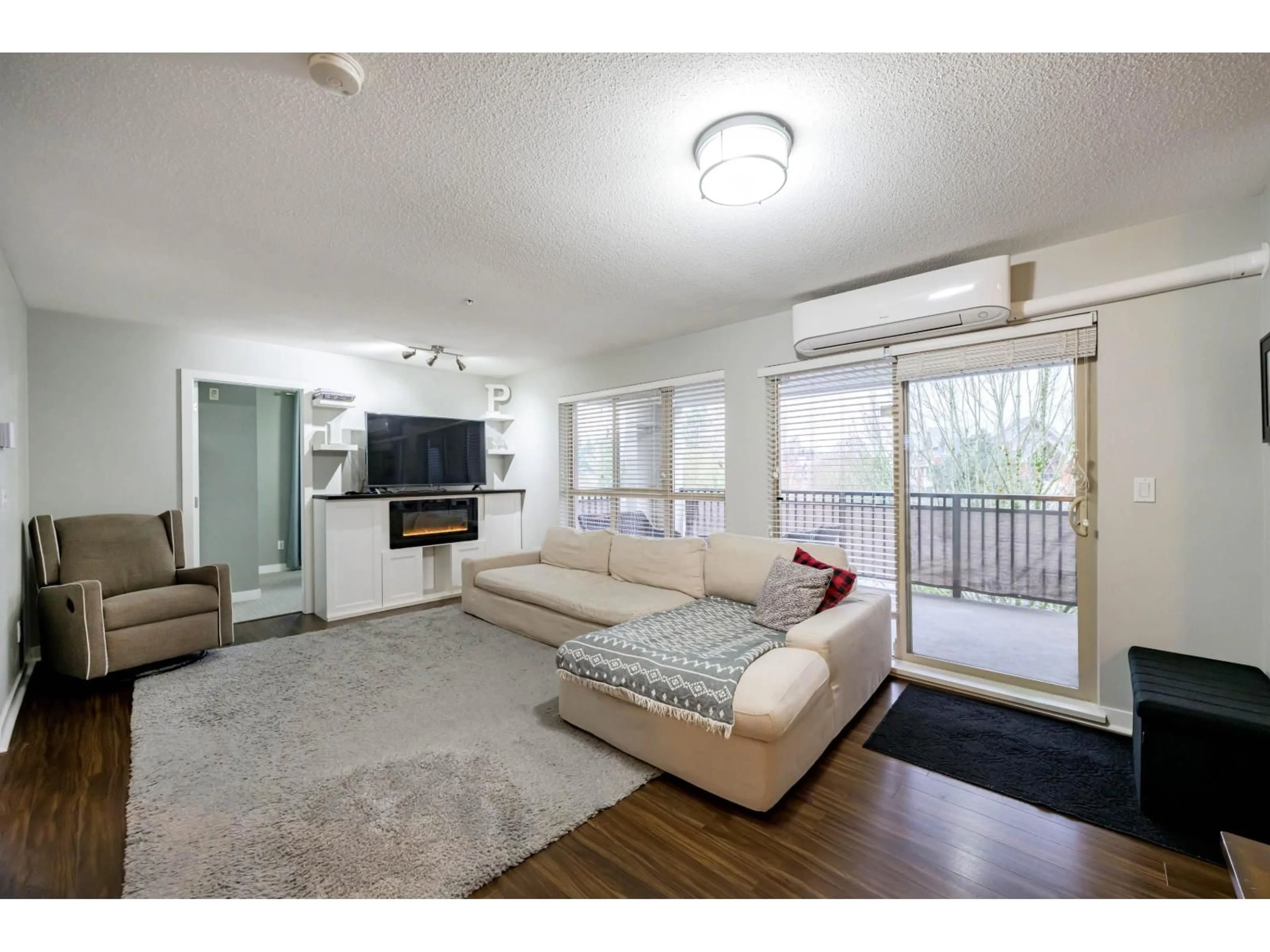 Living room with furniture, unknown for E309 - 8929 202 STREET, Langley British Columbia V1M0B4