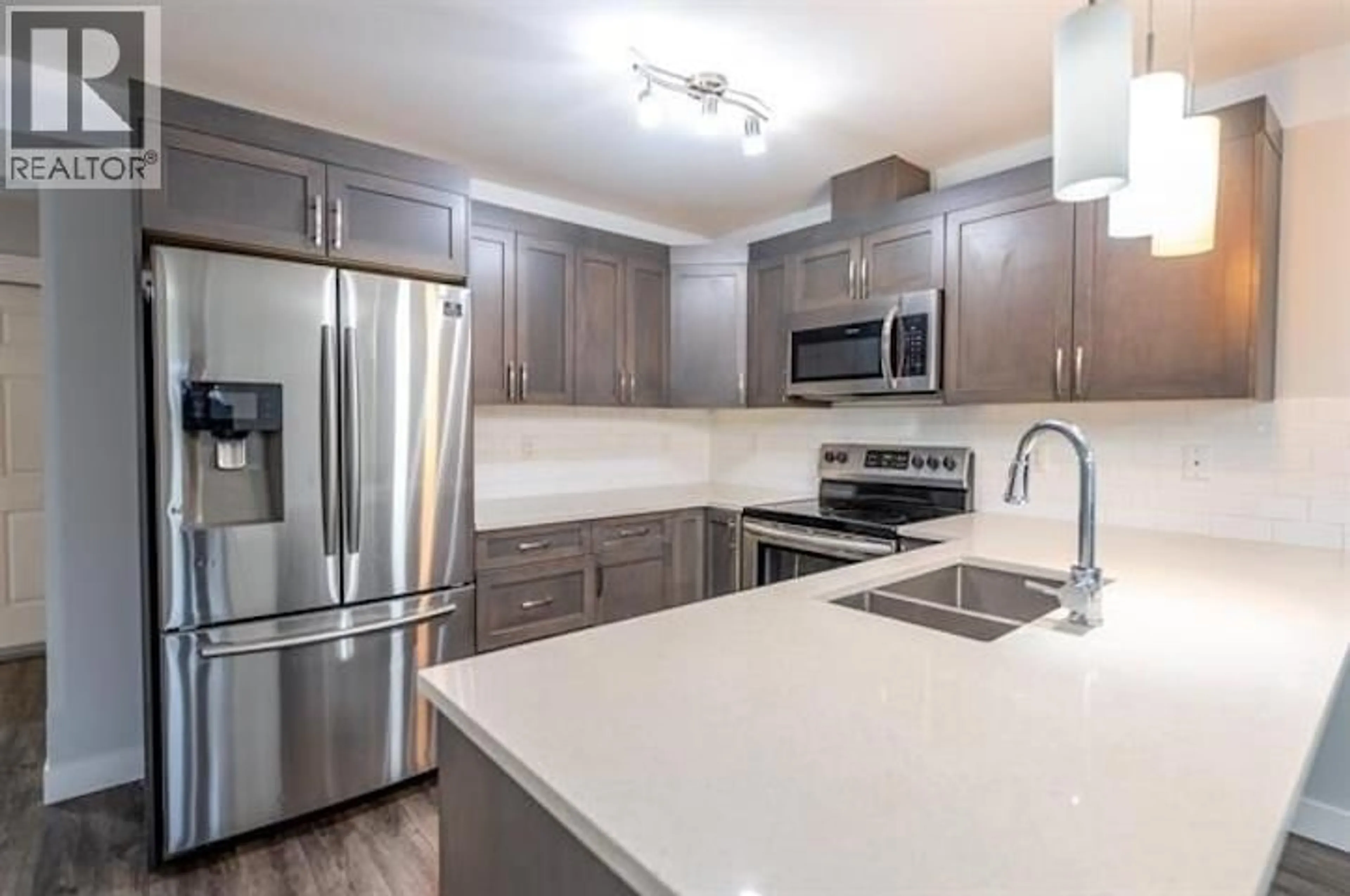 Open concept kitchen, unknown for 302 - 6798 WESTGATE AVENUE, Prince George British Columbia V2N0H6
