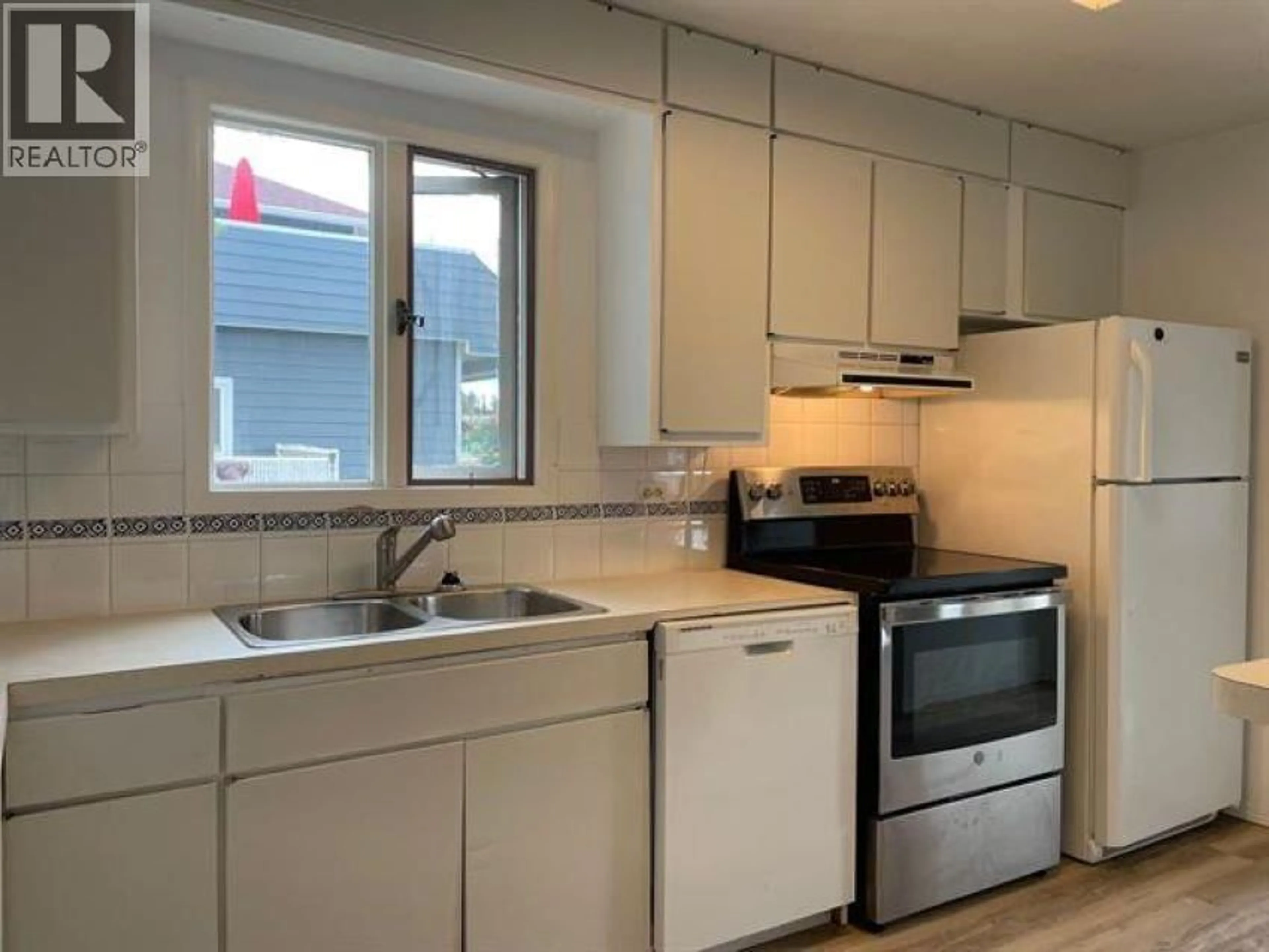 Standard kitchen, wood/laminate floor for 5319 44 STREET, Fort Nelson British Columbia V0C1R0