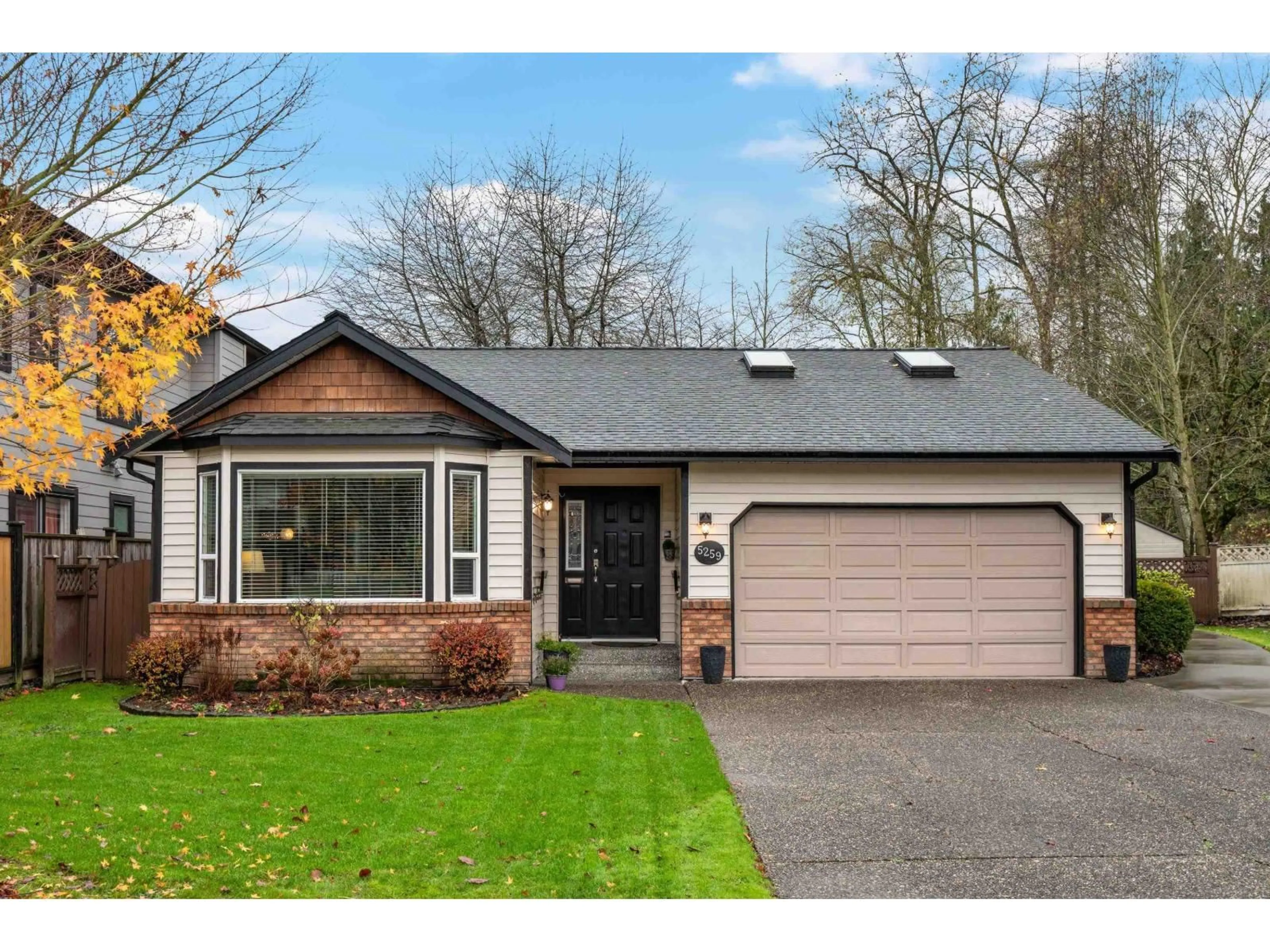 Home with vinyl exterior material, street for 5259 197A STREET, Langley British Columbia V3A7Y1