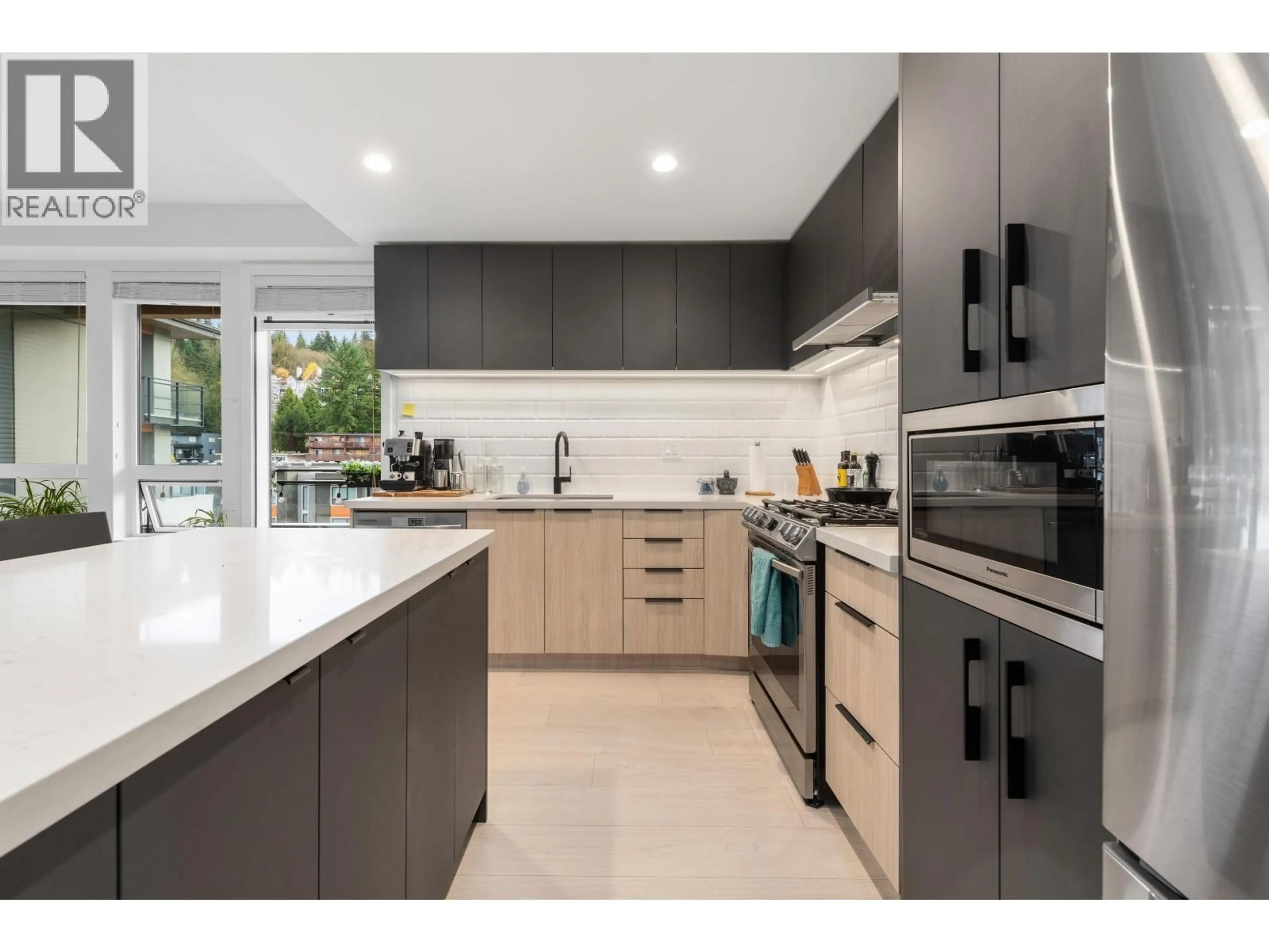 Contemporary kitchen, unknown for 407 - 3018 ST. GEORGE STREET, Port Moody British Columbia V3H0L4