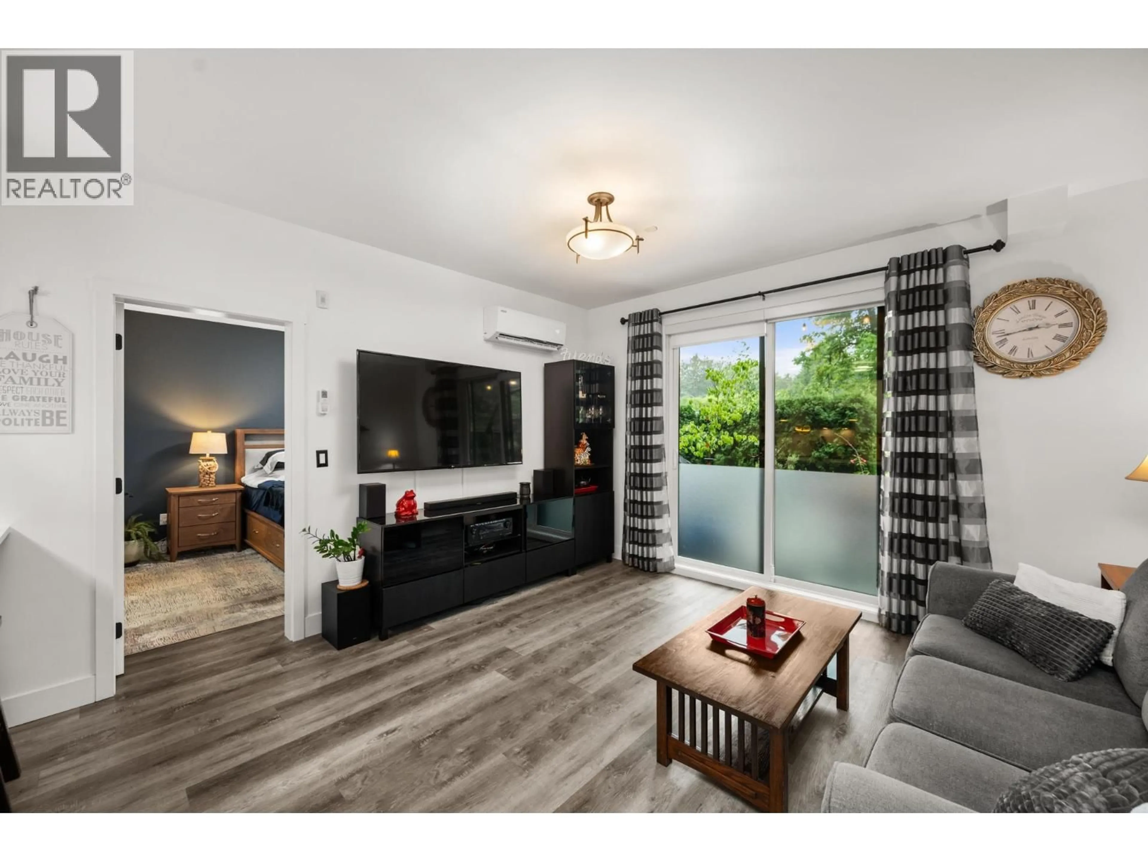 Living room with furniture, wood/laminate floor for 113 - 12320 222 STREET, Maple Ridge British Columbia V2X4K8