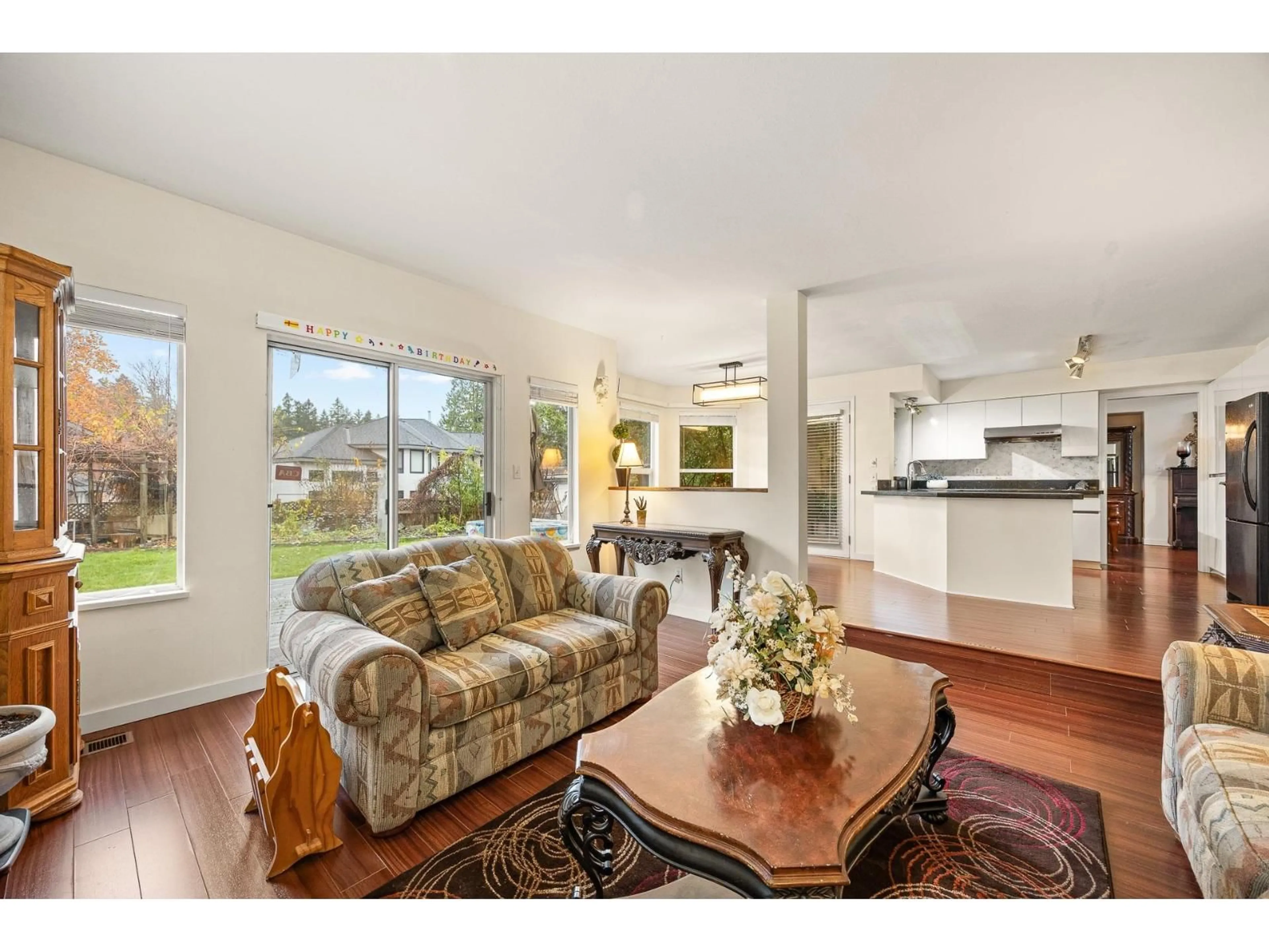 Living room with furniture, wood/laminate floor for 14969 24A AVENUE, Surrey British Columbia V4P1N9