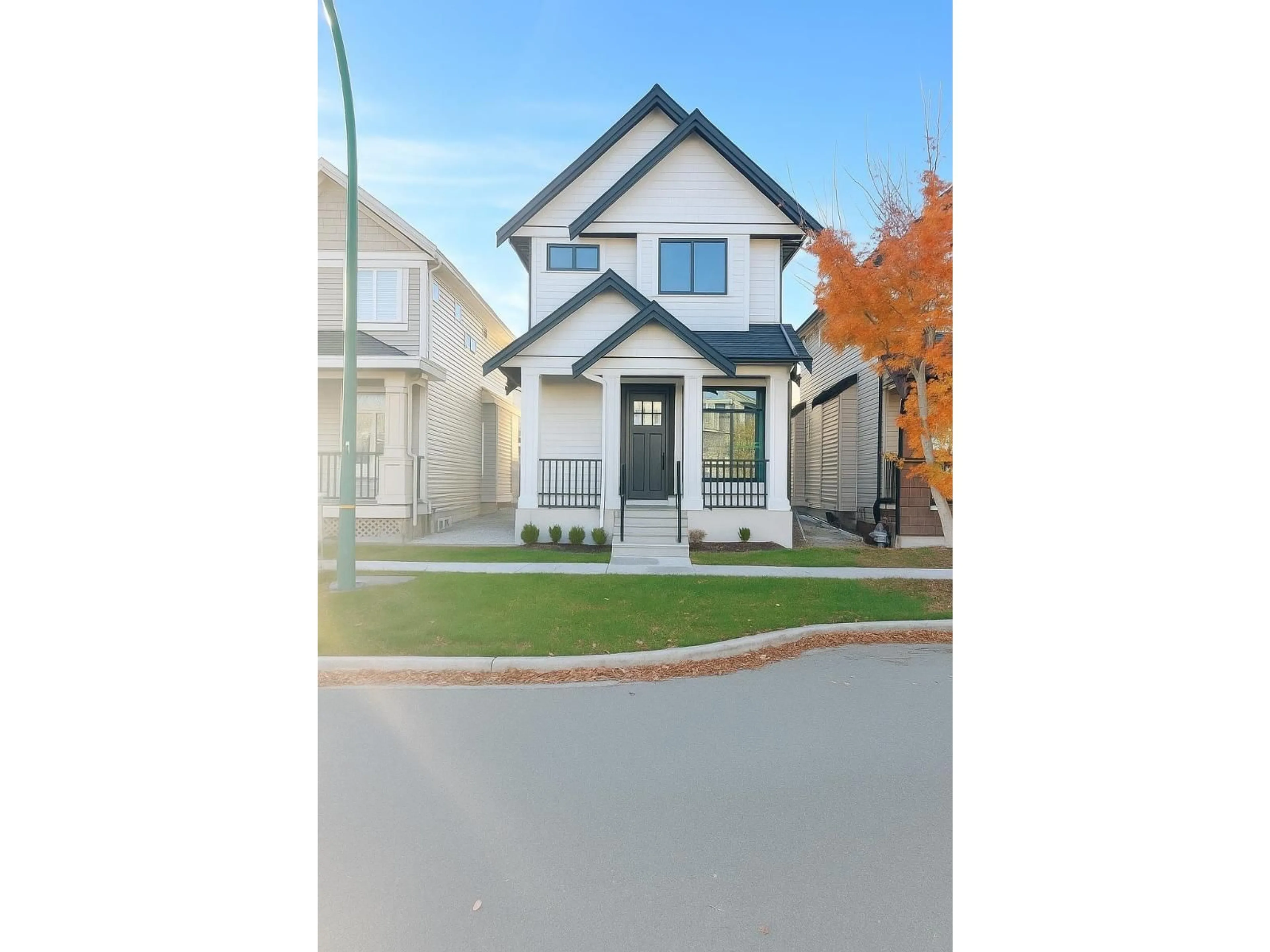 Home with vinyl exterior material, street for 7265 192A STREET, Surrey British Columbia V4N5Y3