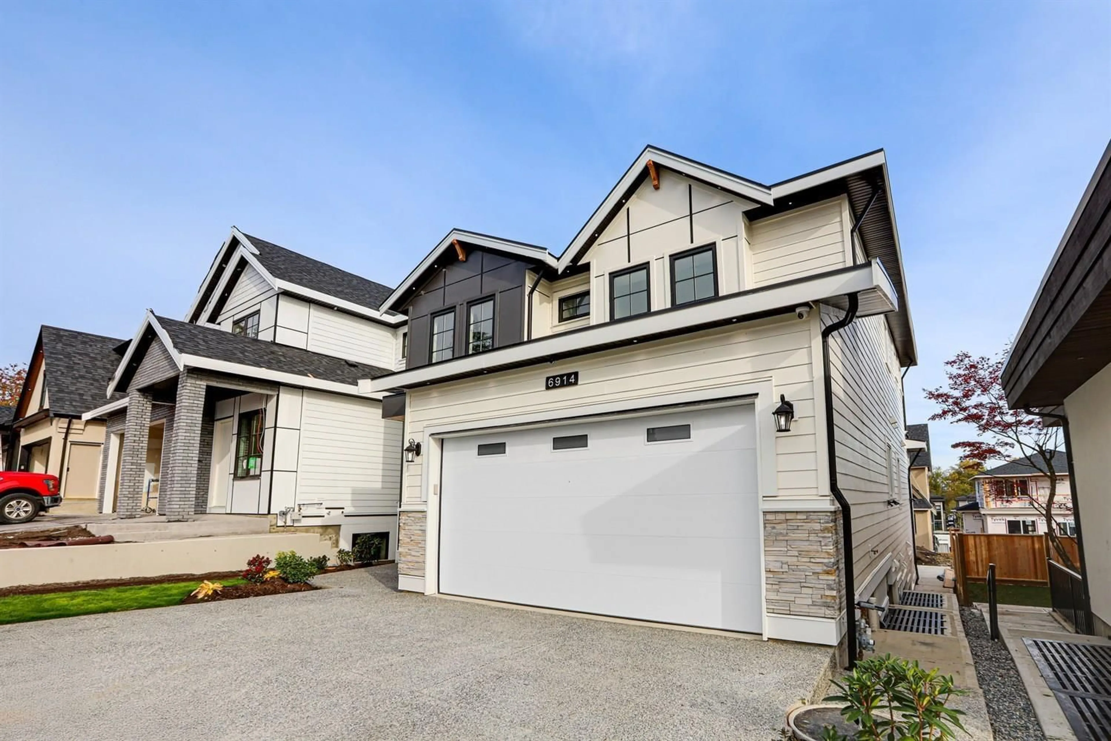 Home with vinyl exterior material, street for 6914 204A STREET, Langley British Columbia V2Y1R2