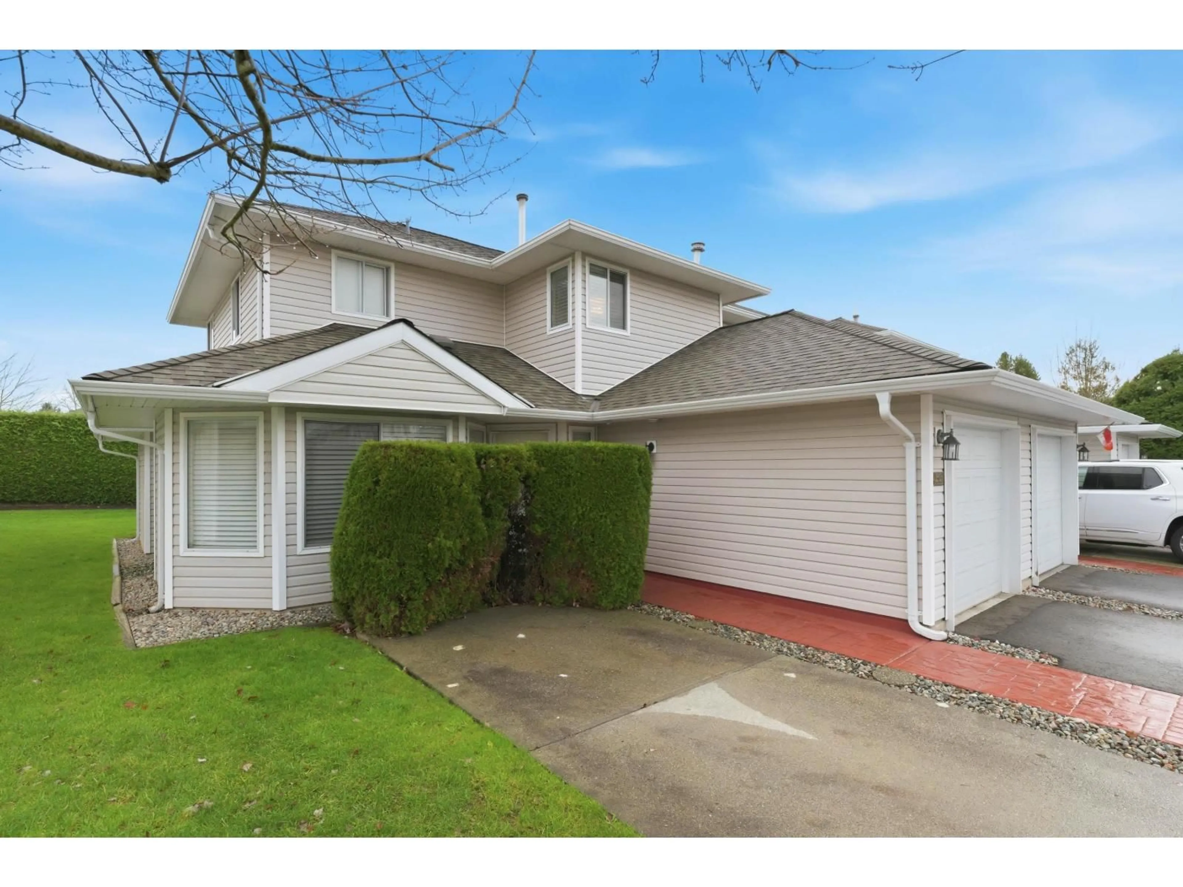 Home with vinyl exterior material, street for 55 - 21928 48 AVENUE, Langley British Columbia V3A8H1