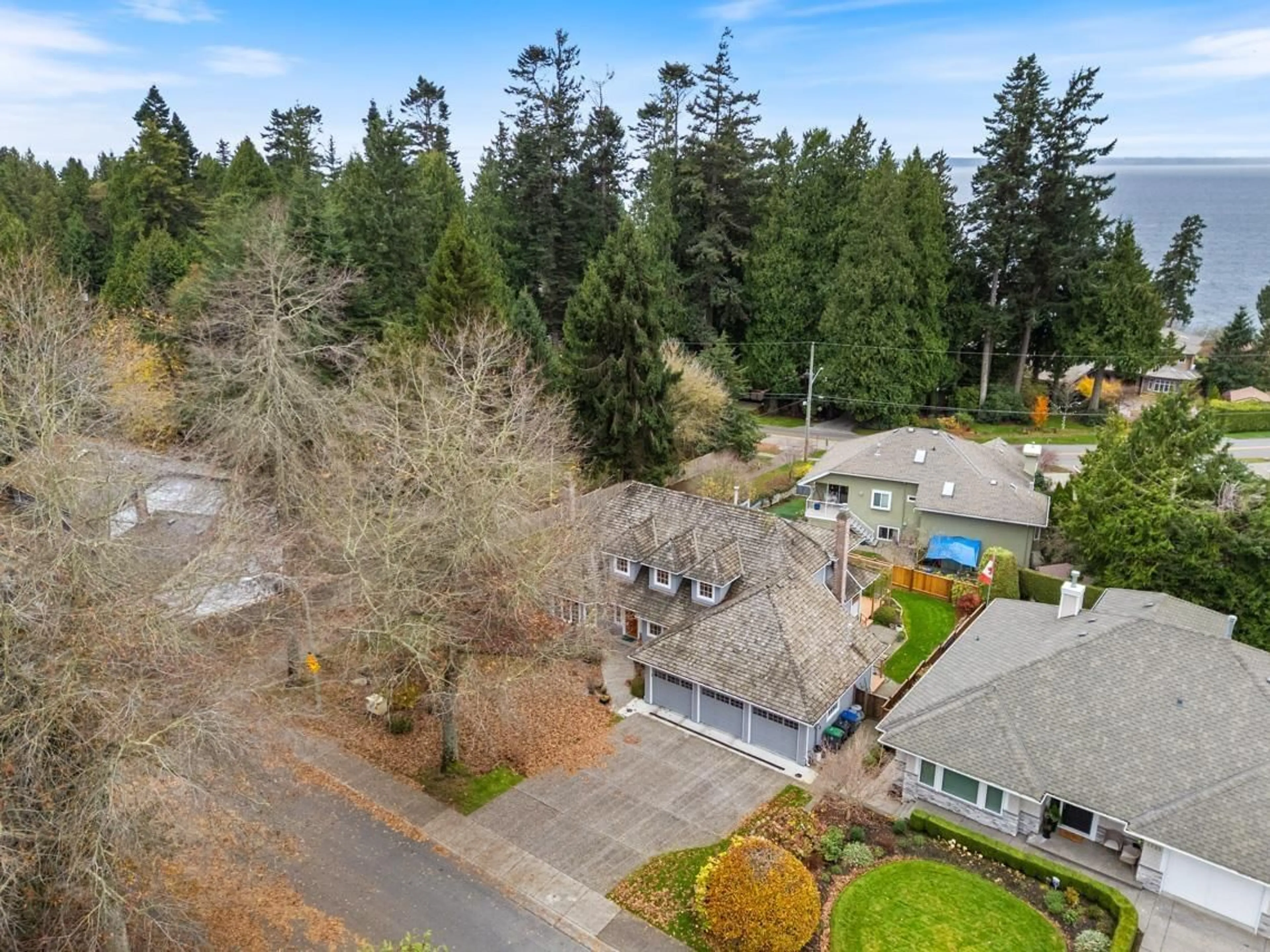 A pic from outside/outdoor area/front of a property/back of a property/a pic from drone, street for 1711 126 STREET, Surrey British Columbia V4A9N6
