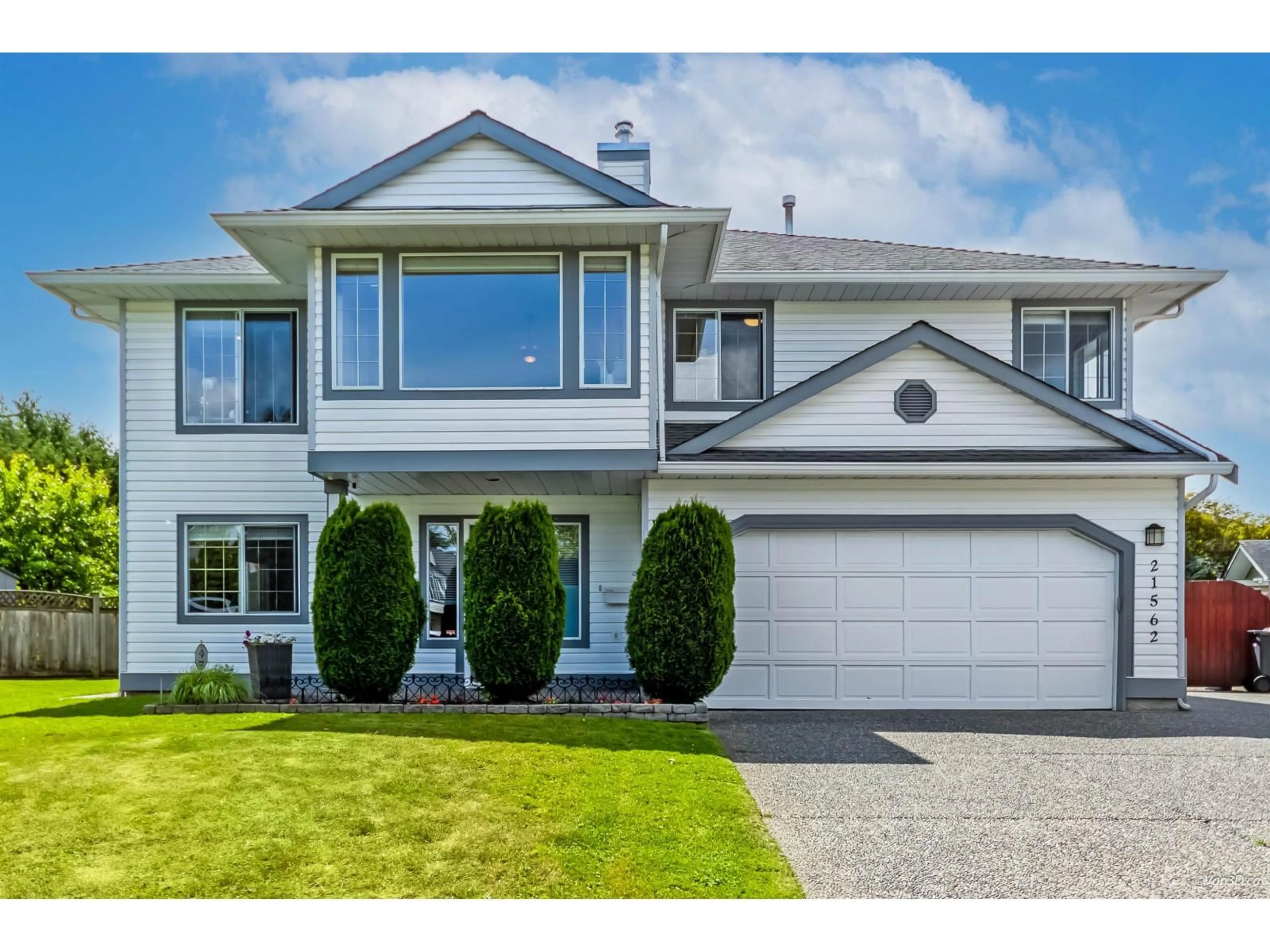 Home with vinyl exterior material, street for 21562 51 AVENUE, Langley British Columbia V3A8V8