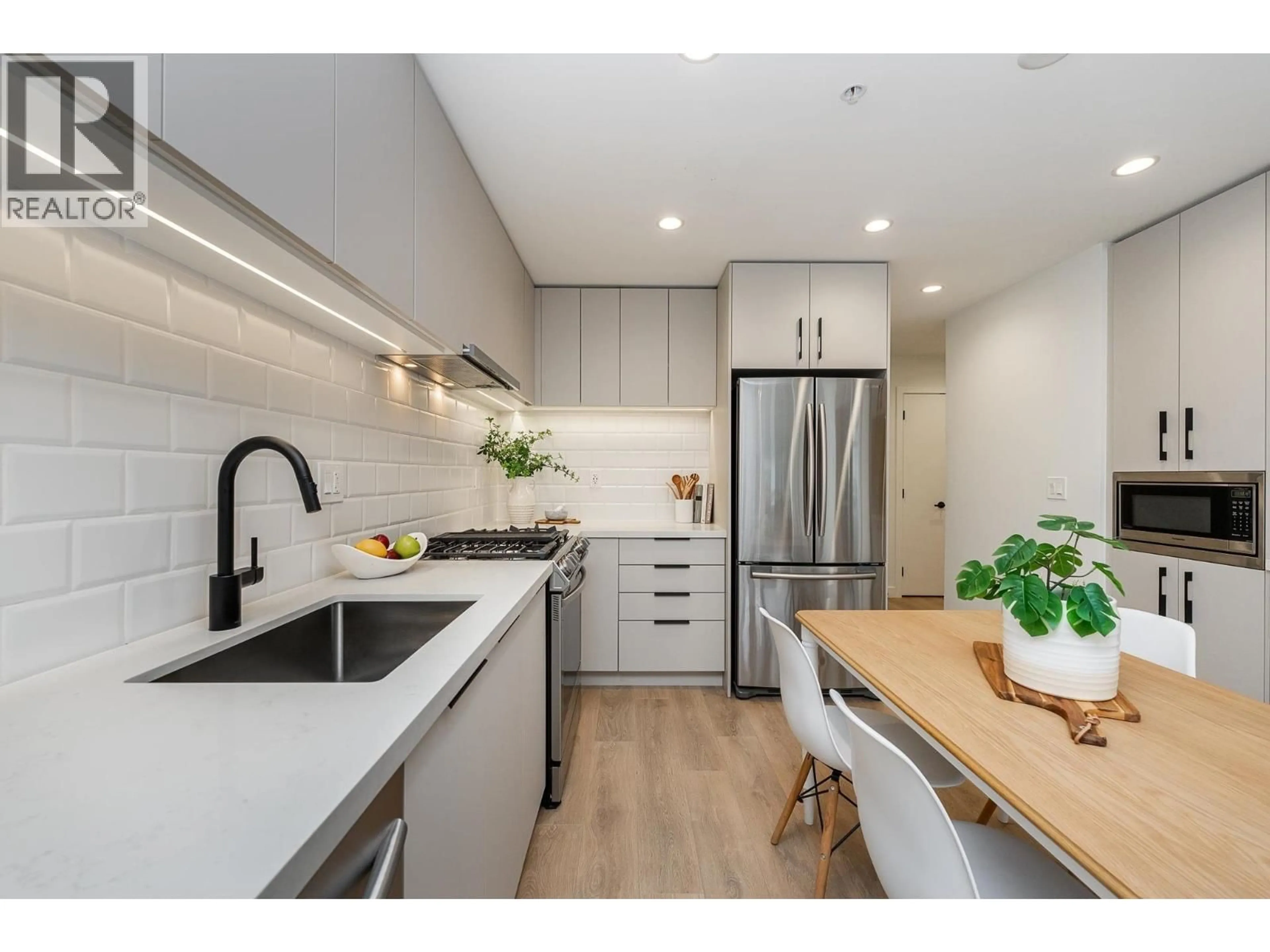 Open concept kitchen, unknown for 112 - 3038 ST. GEORGE STREET STREET, Port Moody British Columbia V3H0L3