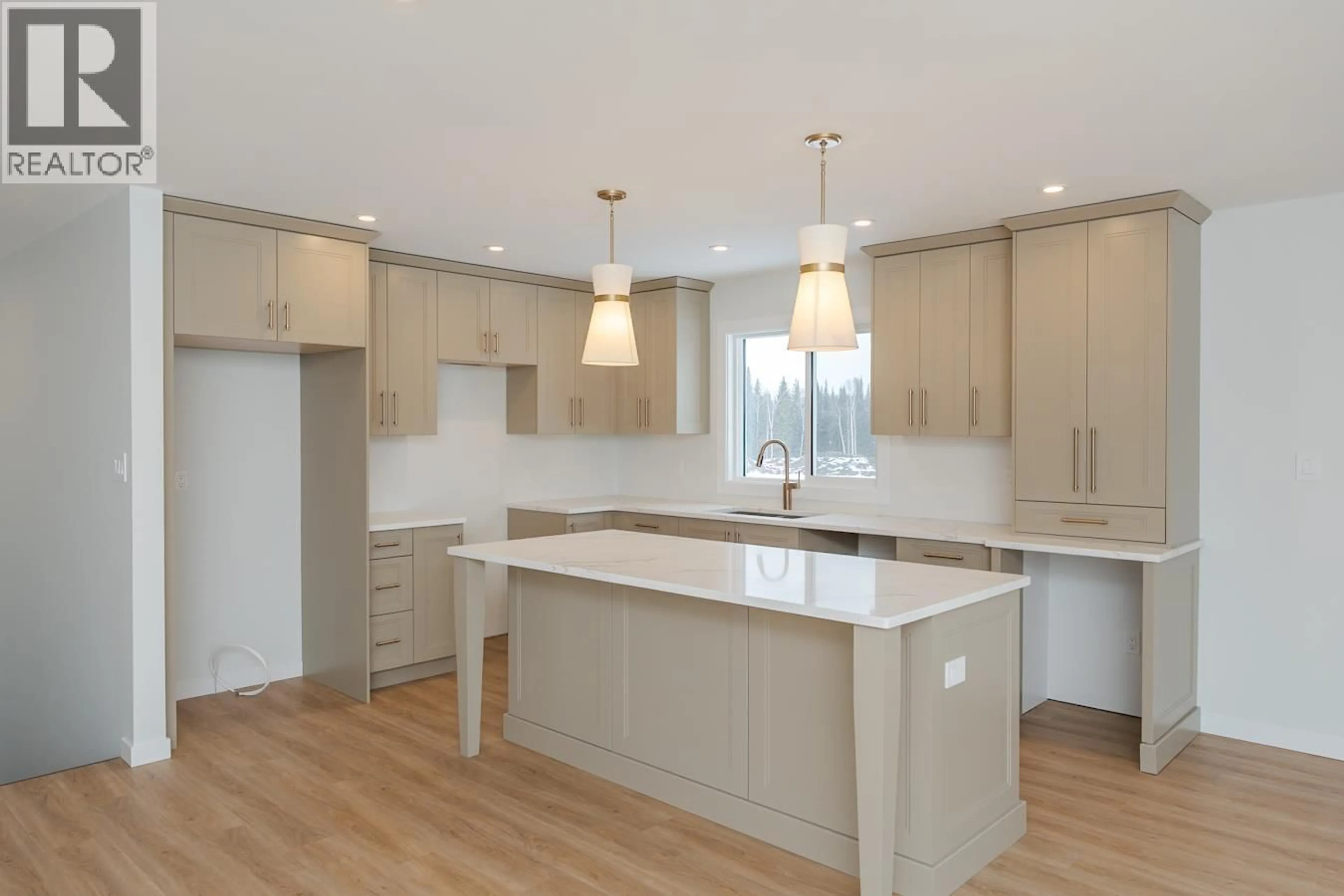 Open concept kitchen, wood/laminate floor for 5108 WOODVALLEY DRIVE, Prince George British Columbia V2K0B6