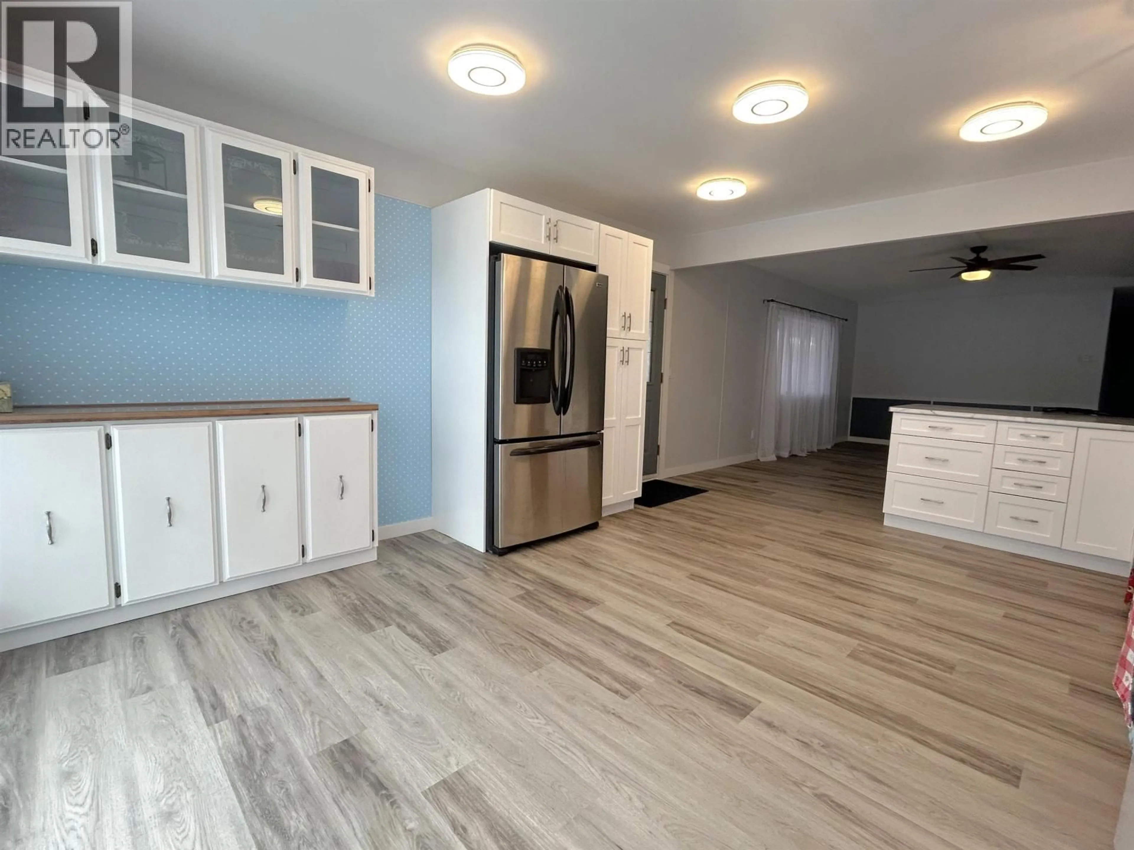 Open concept kitchen, wood/laminate floor for 82 - 1000 INVERNESS ROAD, Prince George British Columbia V2K4V1