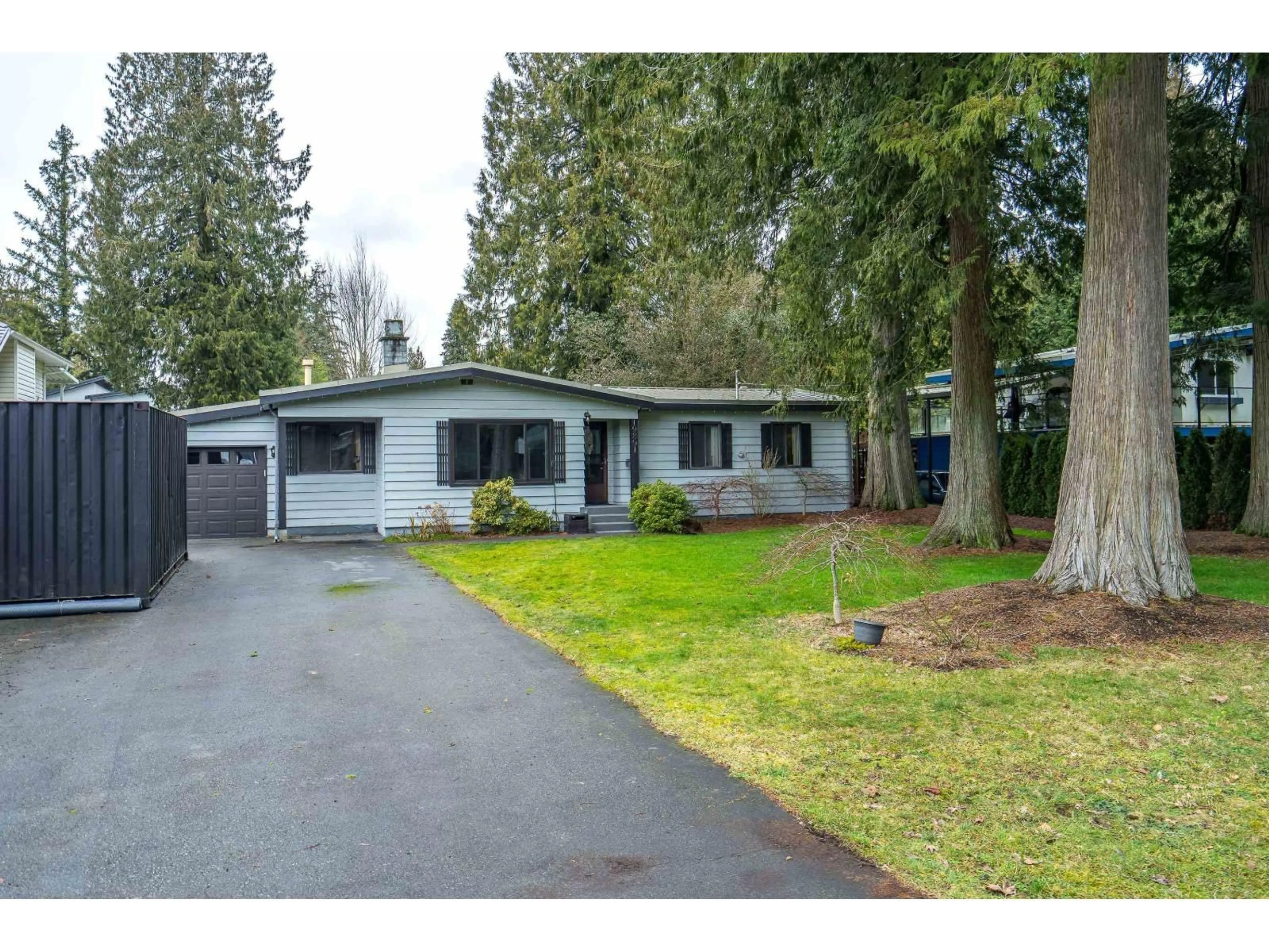 Home with vinyl exterior material, street for 19891 43A AVENUE, Langley British Columbia V3A3C3