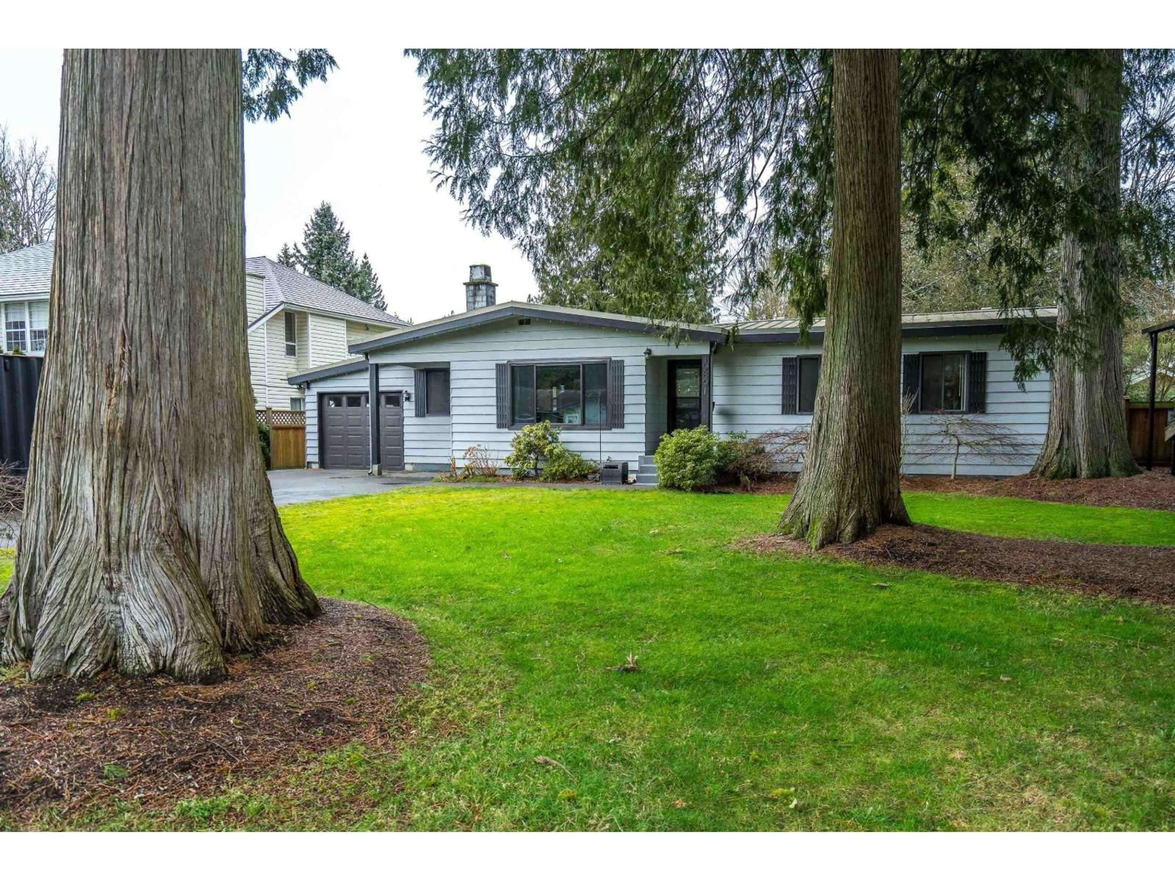 Home with vinyl exterior material, street for 19891 43A AVENUE, Langley British Columbia V3A3C3