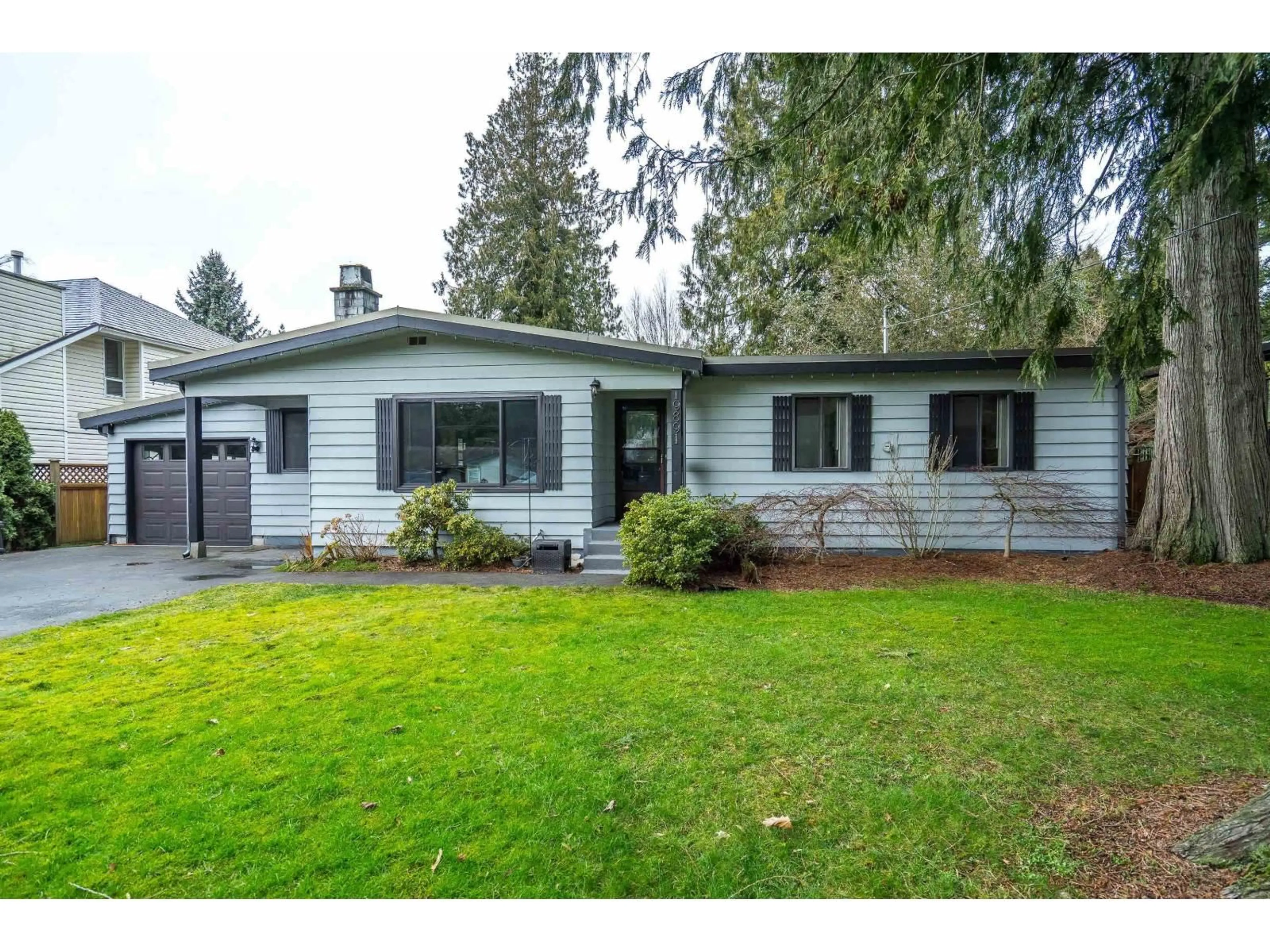 Home with vinyl exterior material, street for 19891 43A AVENUE, Langley British Columbia V3A3C3