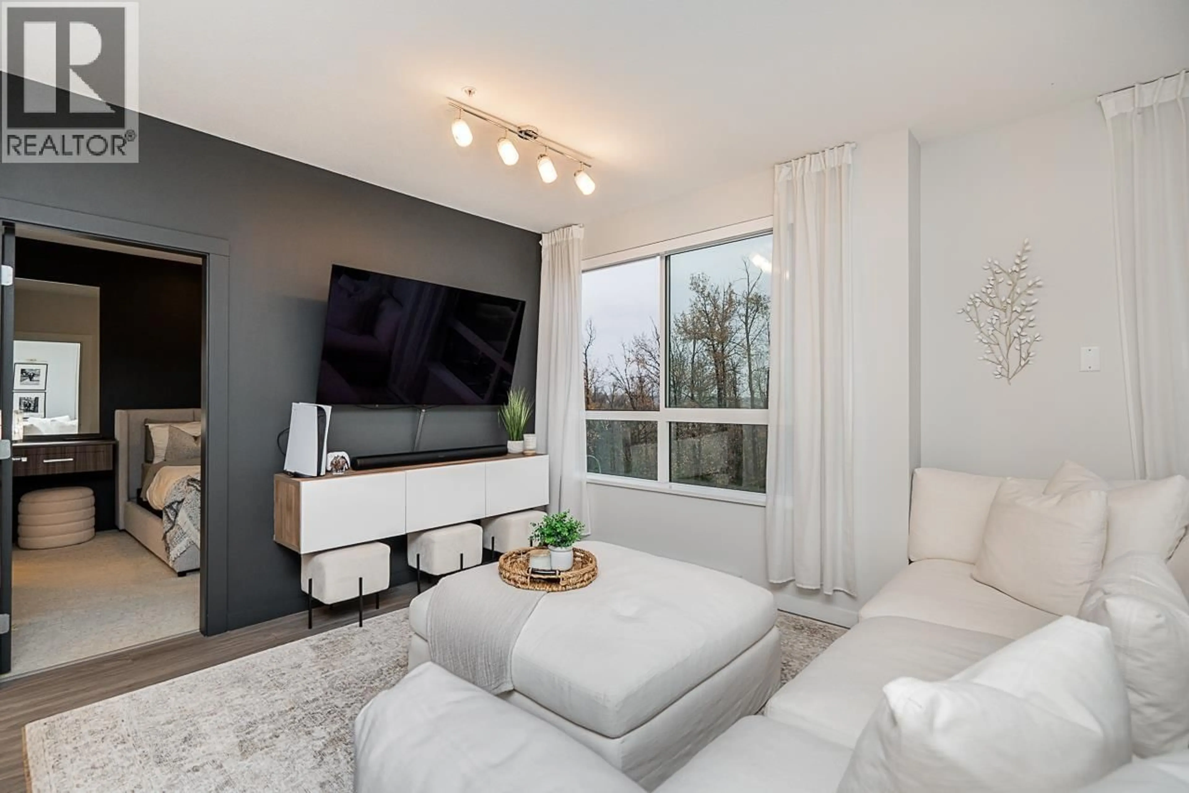 Living room with furniture, unknown for 401 - 6438 BYRNEPARK DRIVE, Burnaby British Columbia V3N0J2