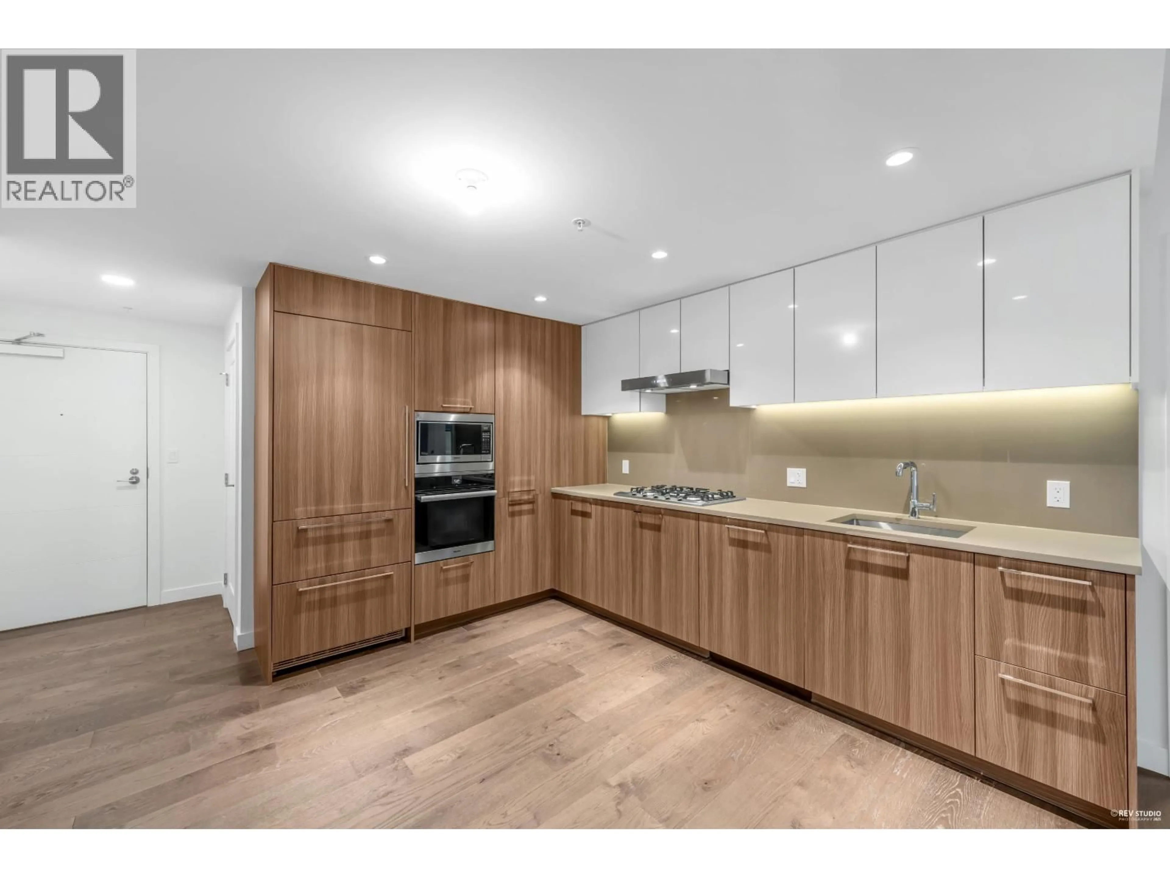 Open concept kitchen, wood/laminate floor for 612 - 8160 MCMYN WAY, Richmond British Columbia V6X0V2