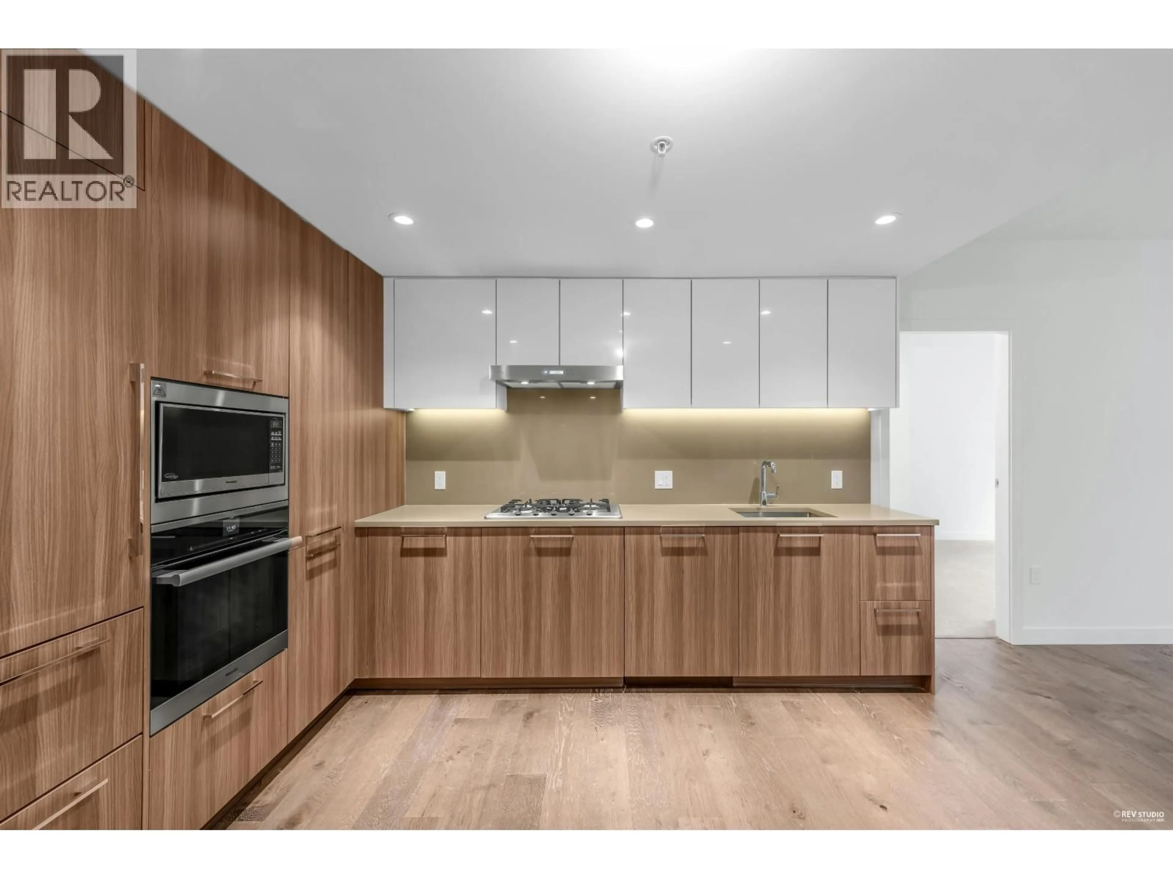 Open concept kitchen, wood/laminate floor for 612 - 8160 MCMYN WAY, Richmond British Columbia V6X0V2