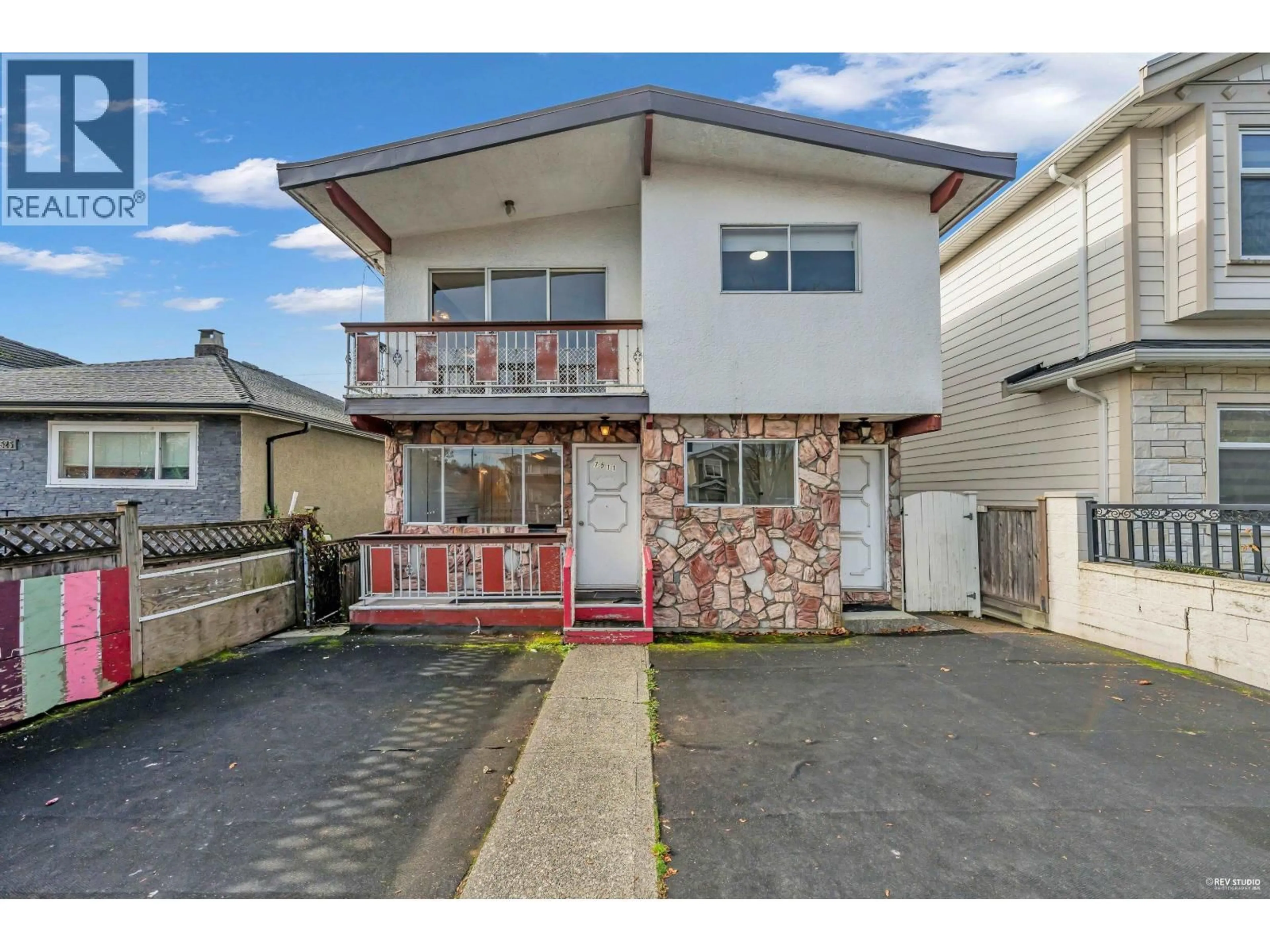 A pic from outside/outdoor area/front of a property/back of a property/a pic from drone, street for 7511 MAIN STREET, Vancouver British Columbia V5X3K1