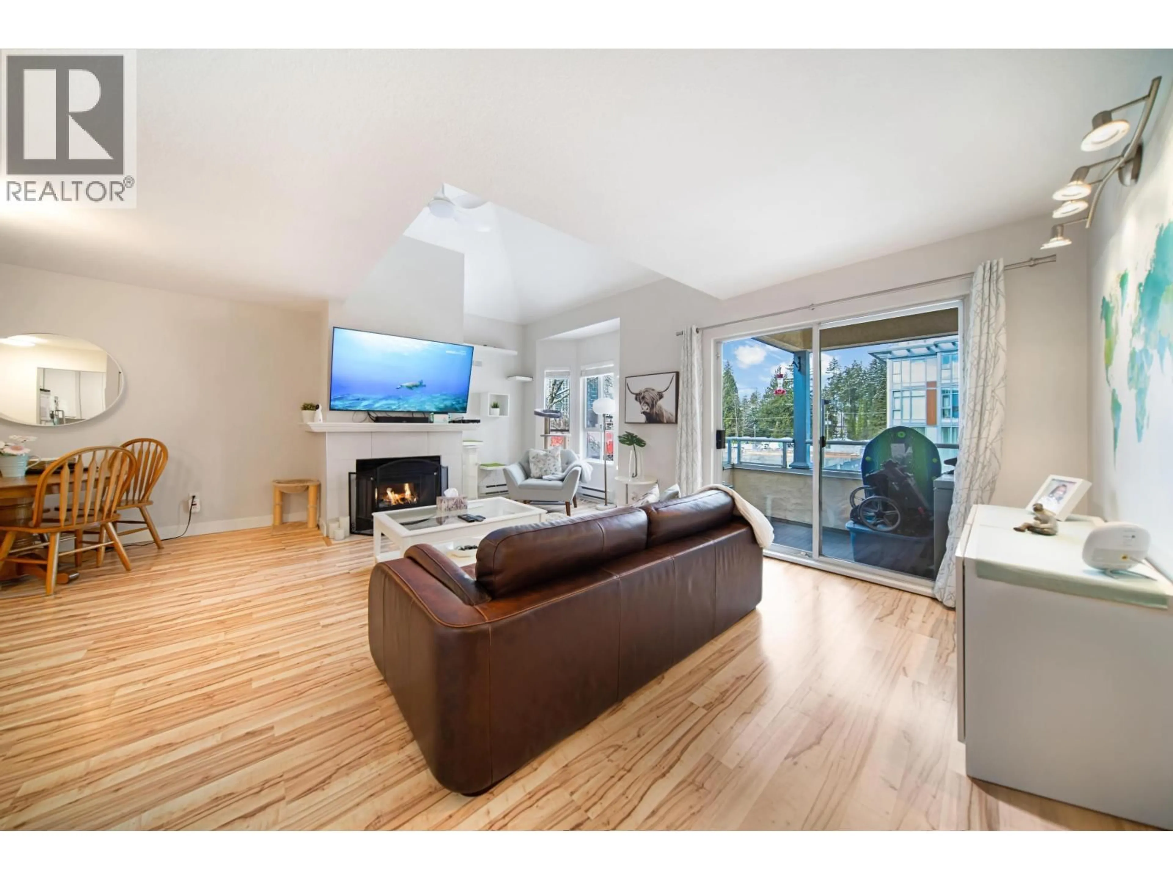 Living room with furniture, wood/laminate floor for 305 - 1175 HEFFLEY CRESCENT, Coquitlam British Columbia V3B7J2