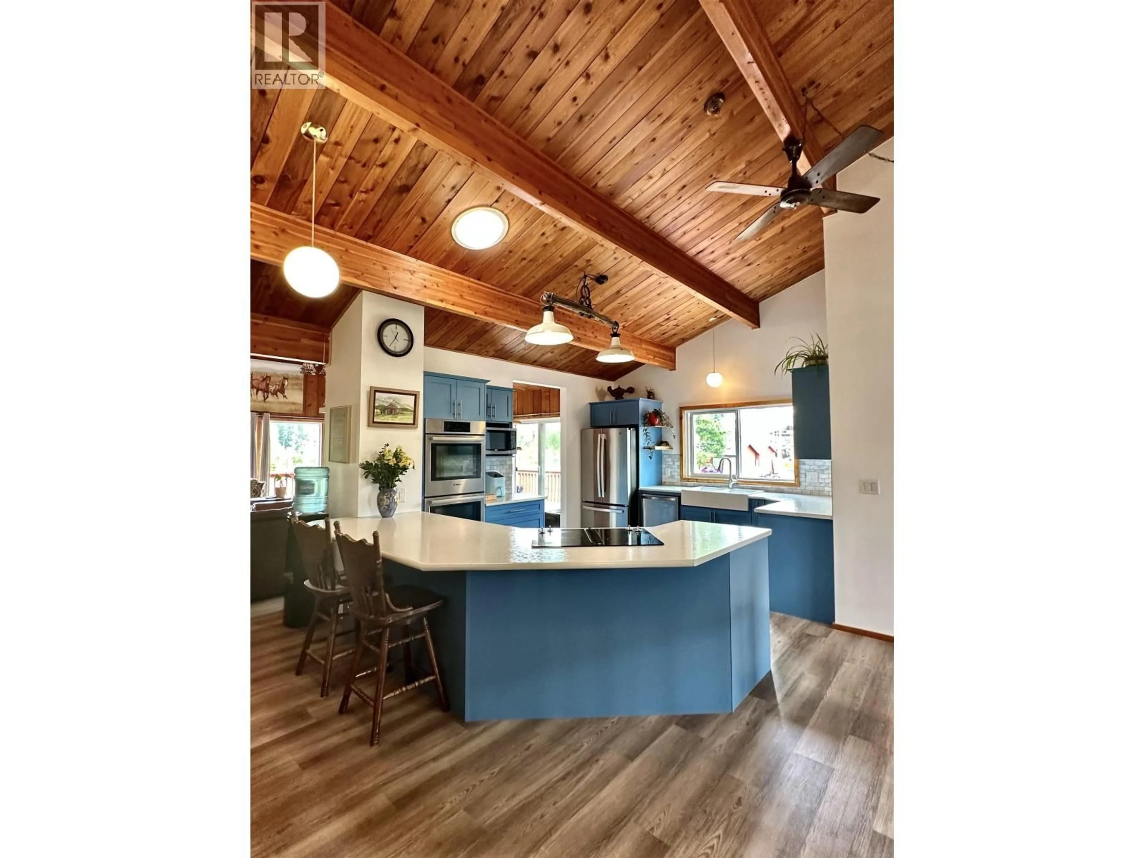 Open concept kitchen, wood/laminate floor for 1485 CRANBERRY LAKE ROAD, Valemount British Columbia V0E2Z0