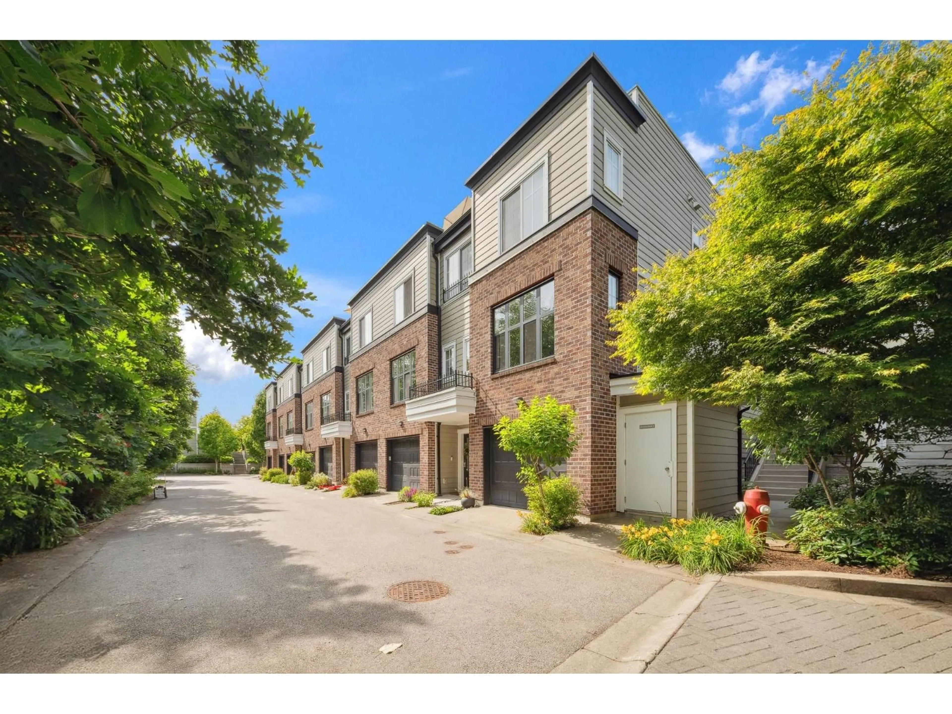 A pic from outside/outdoor area/front of a property/back of a property/a pic from drone, street for 94 - 15588 32 AVENUE, Surrey British Columbia V3Z0G3