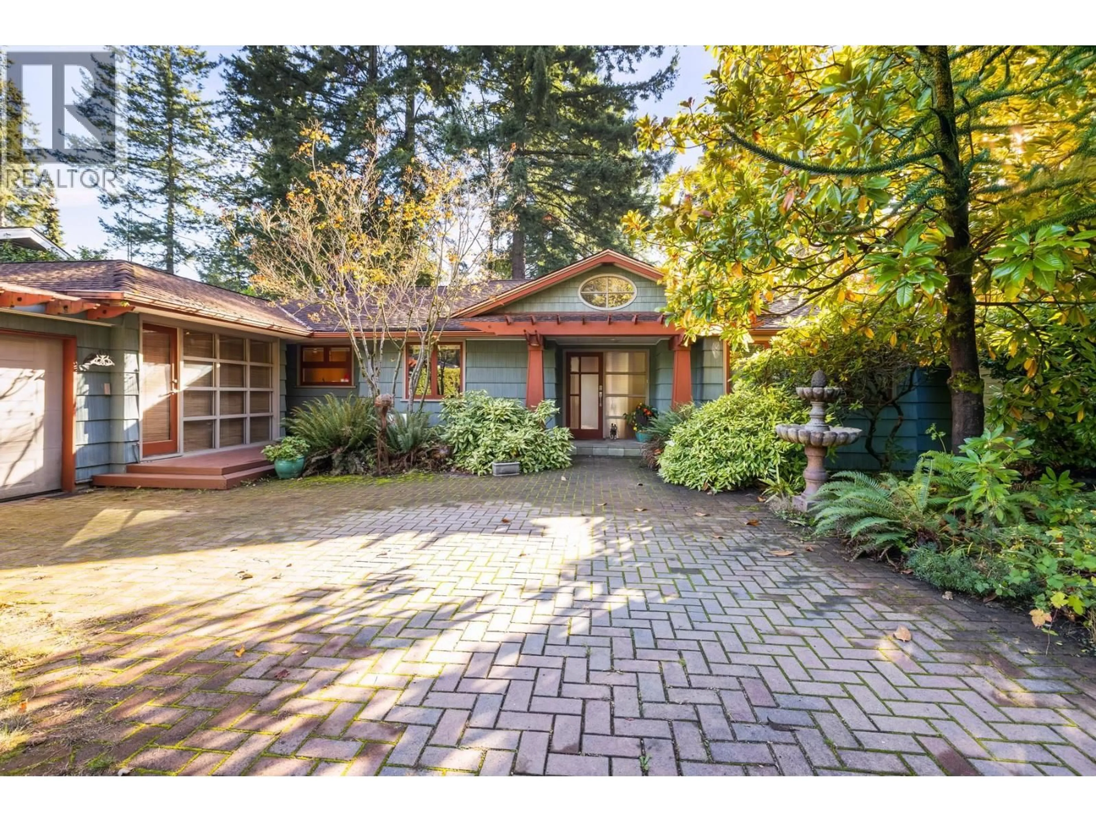 Home with brick exterior material, street for 1090 KEITH ROAD, North Vancouver British Columbia V7P1Y5