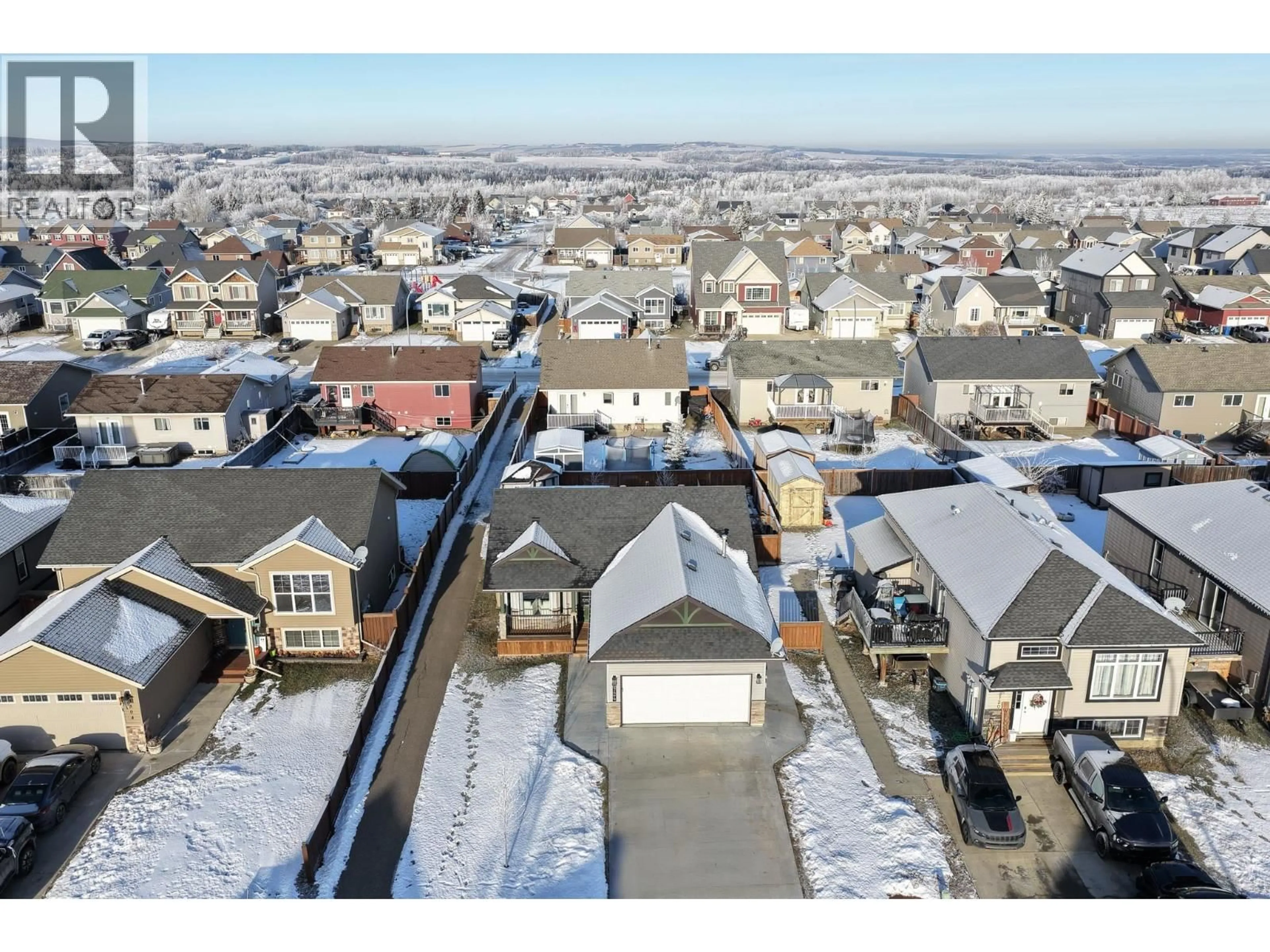 A pic from outside/outdoor area/front of a property/back of a property/a pic from drone, street for 8724 113 AVENUE, Fort St. John British Columbia V1J0E2