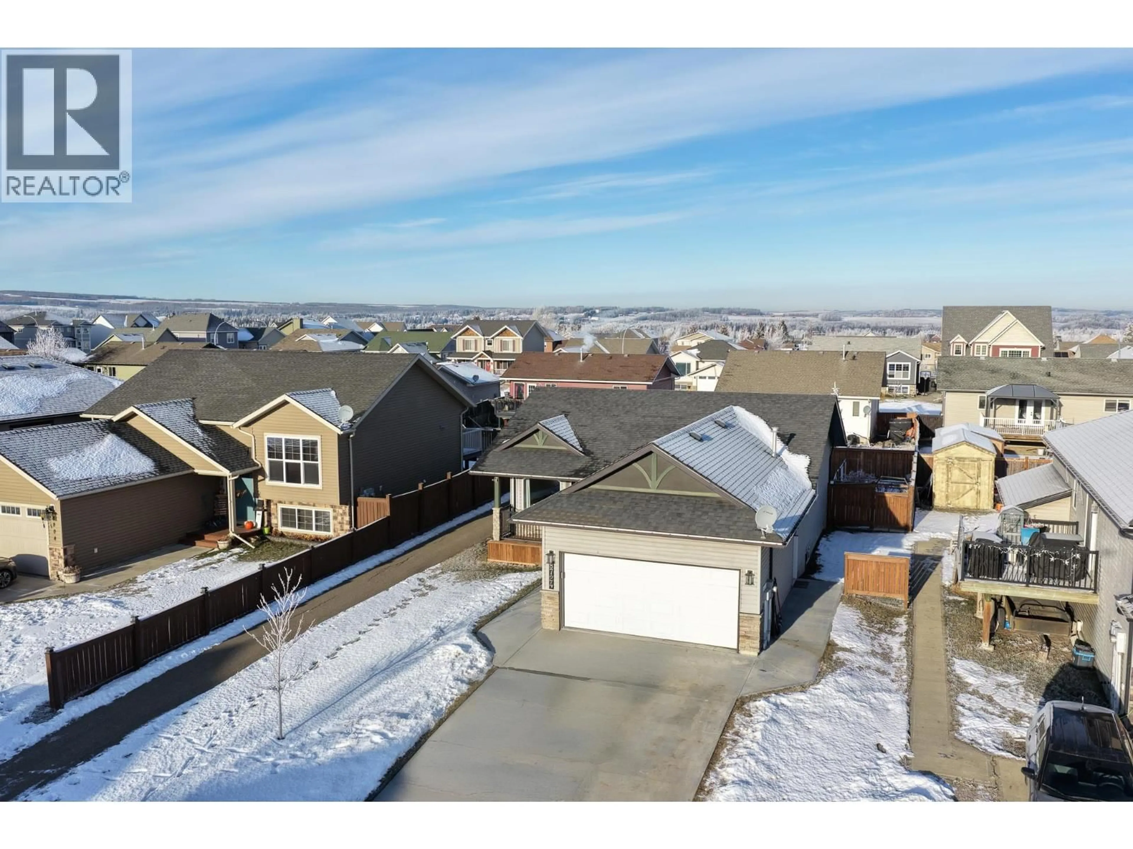 A pic from outside/outdoor area/front of a property/back of a property/a pic from drone, street for 8724 113 AVENUE, Fort St. John British Columbia V1J0E2