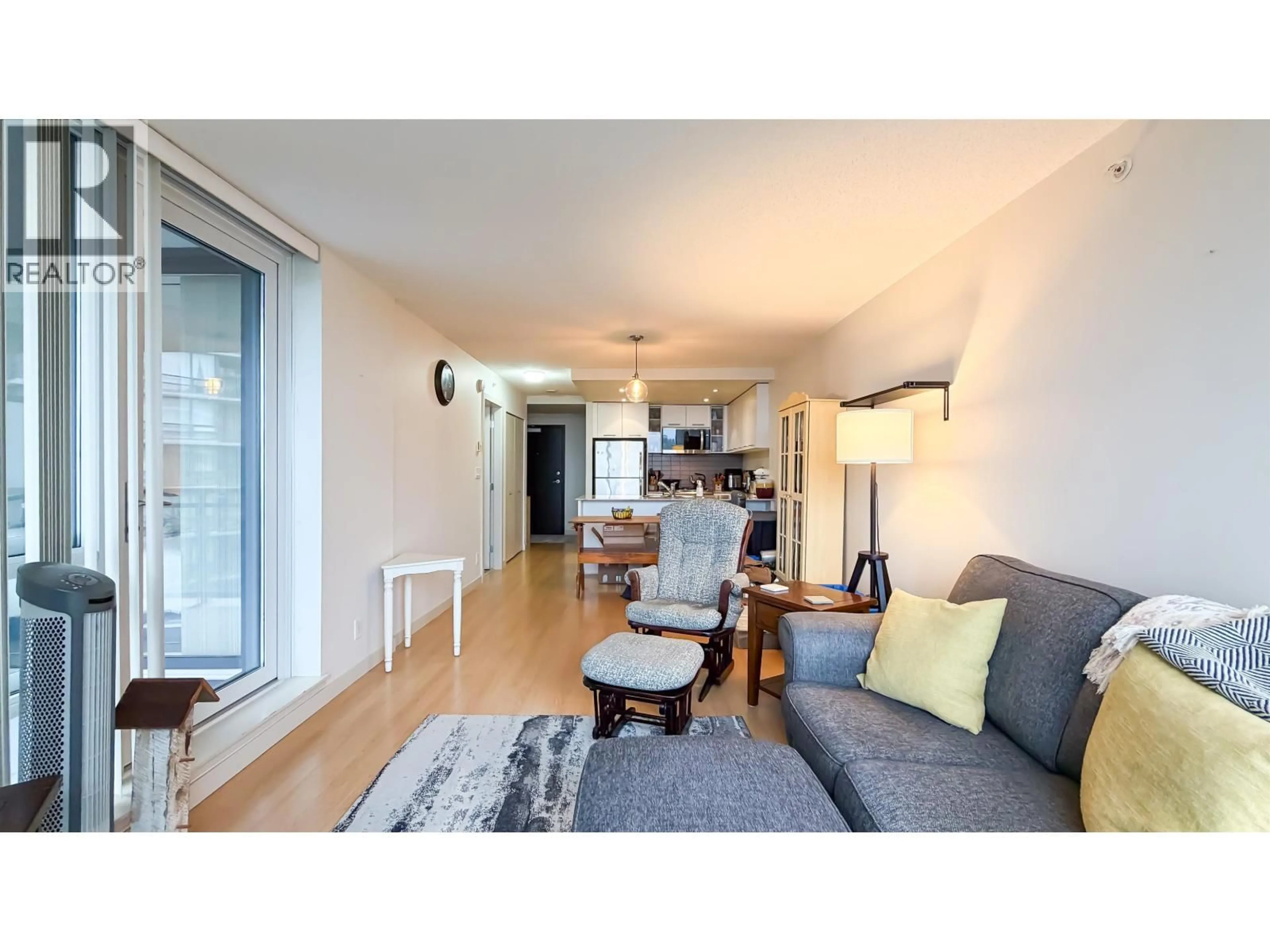 Living room with furniture, wood/laminate floor for 1007 - 3111 CORVETTE WAY, Richmond British Columbia V6X4K3