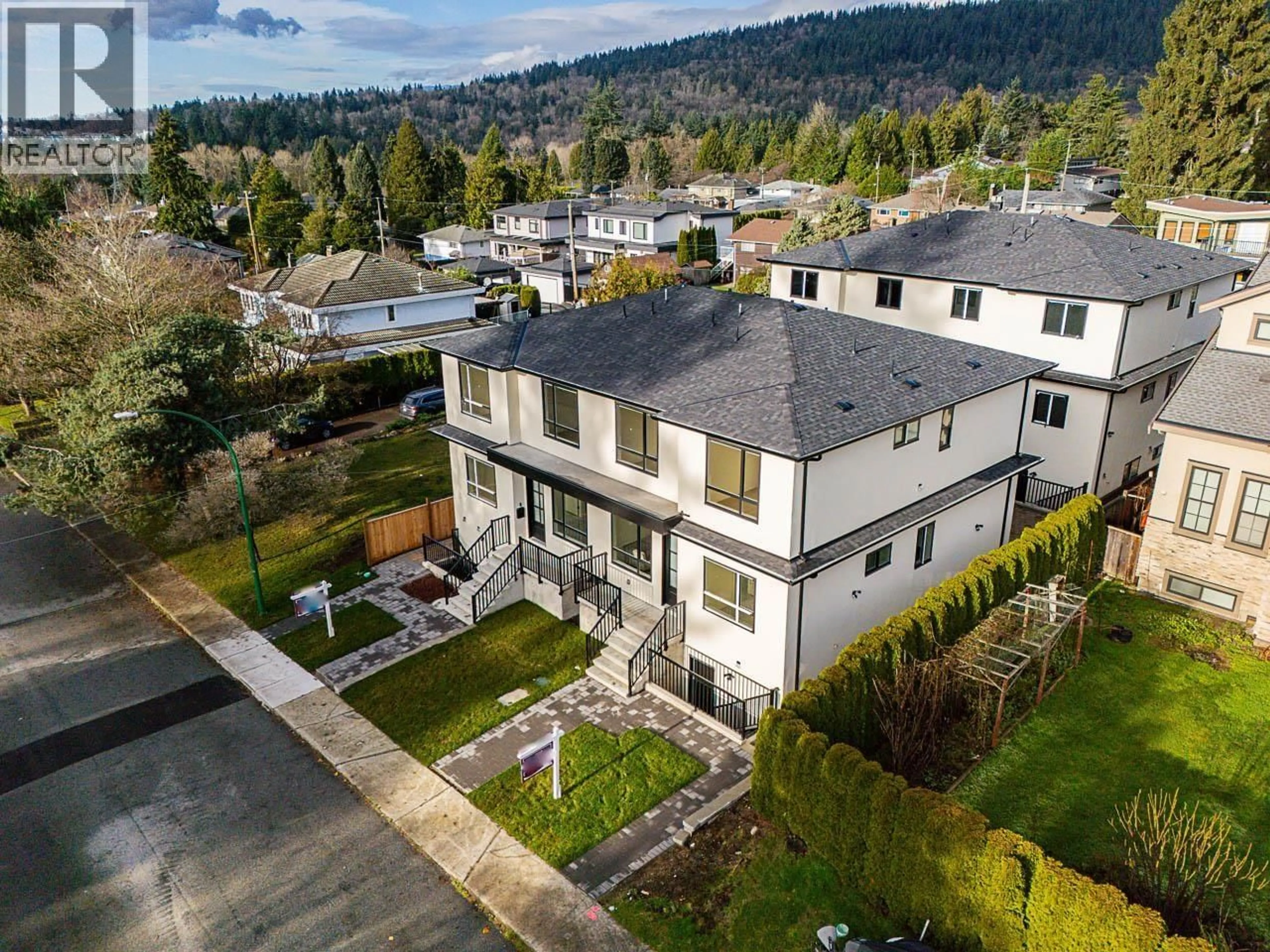 A pic from outside/outdoor area/front of a property/back of a property/a pic from drone, mountain view for 1 - 9935 SULLIVAN STREET, Burnaby British Columbia V3J1J1