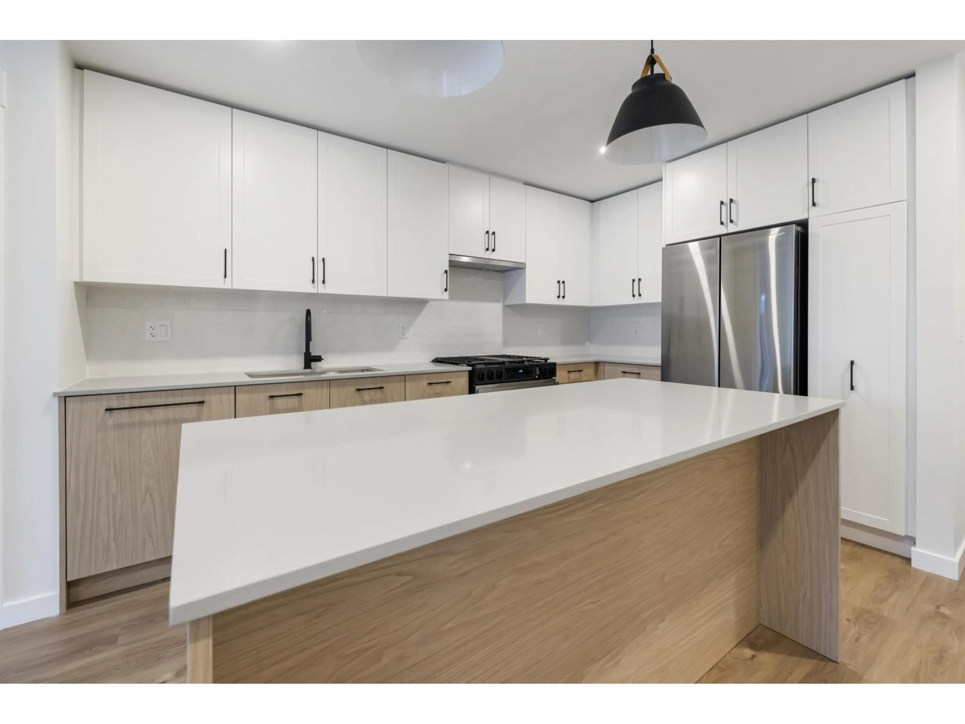 Open concept kitchen, unknown for 302 - 27218 ALDERGROVE TOWN CENTRE DRIVE, Langley British Columbia V4W0E4