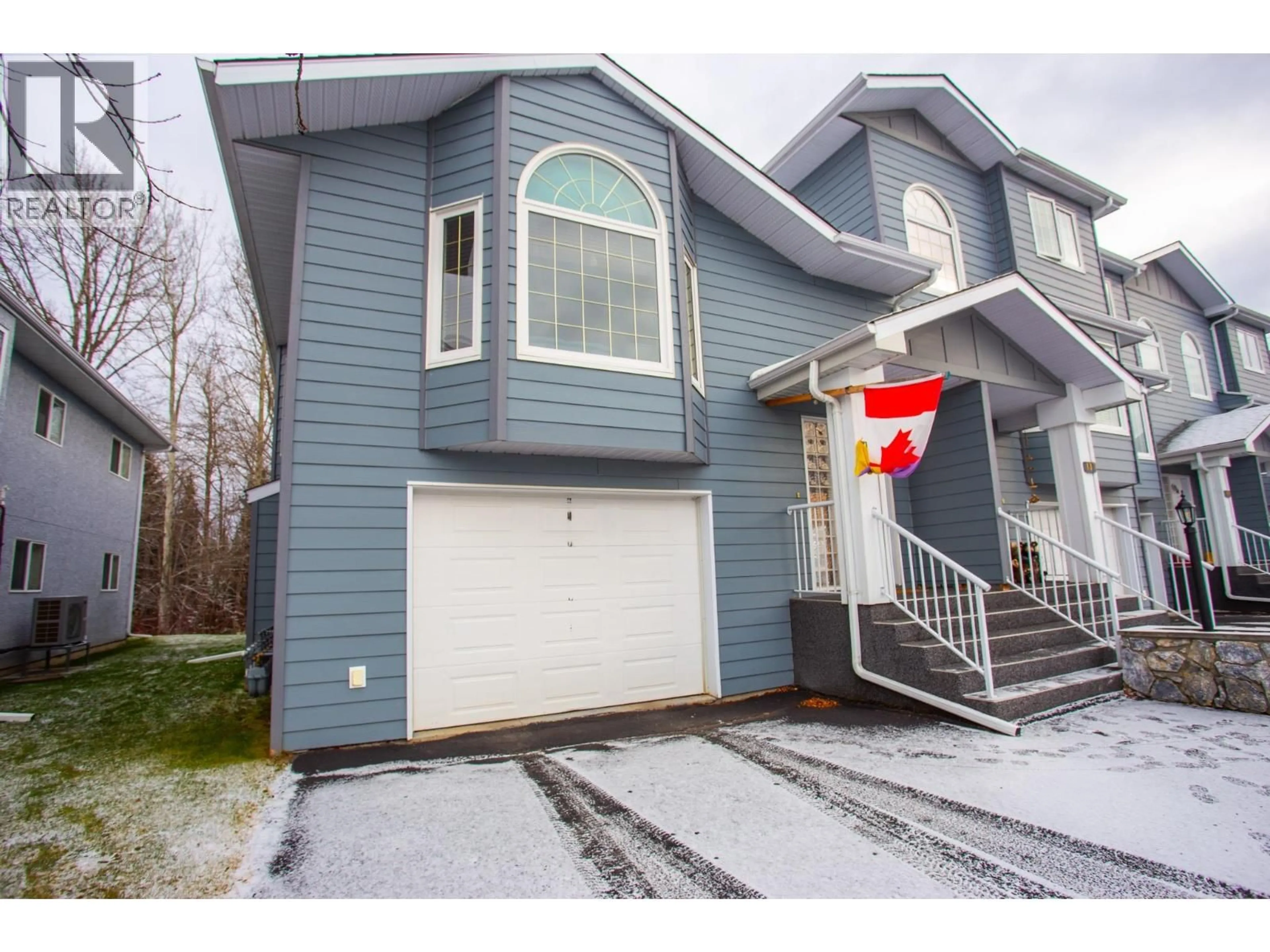 Home with vinyl exterior material, street for 108 - 6450 DAWSON ROAD, Prince George British Columbia V2K5Y4