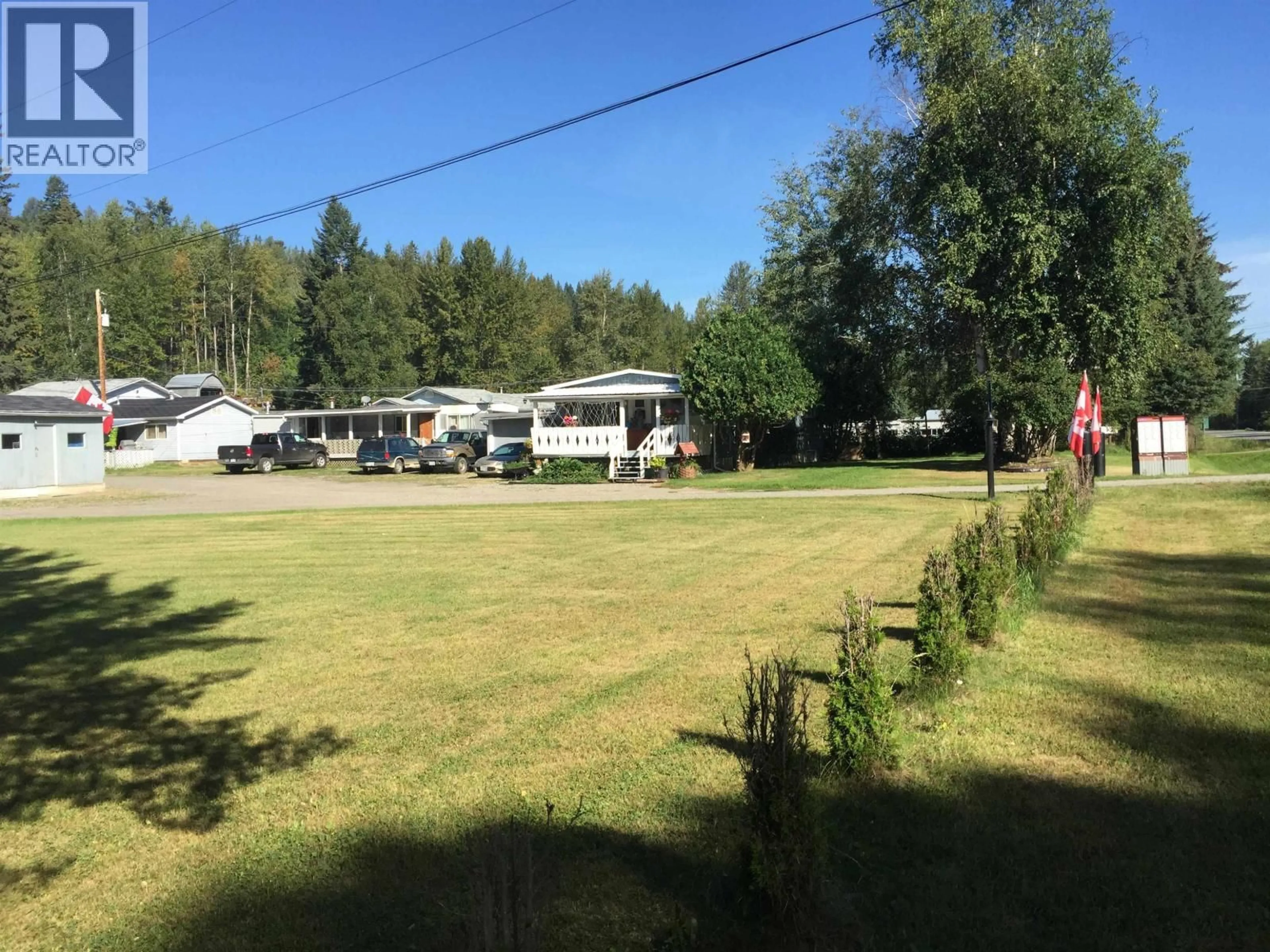 A pic from outside/outdoor area/front of a property/back of a property/a pic from drone, street for 1172 WEST FRASER ROAD, Quesnel British Columbia V2J6H8