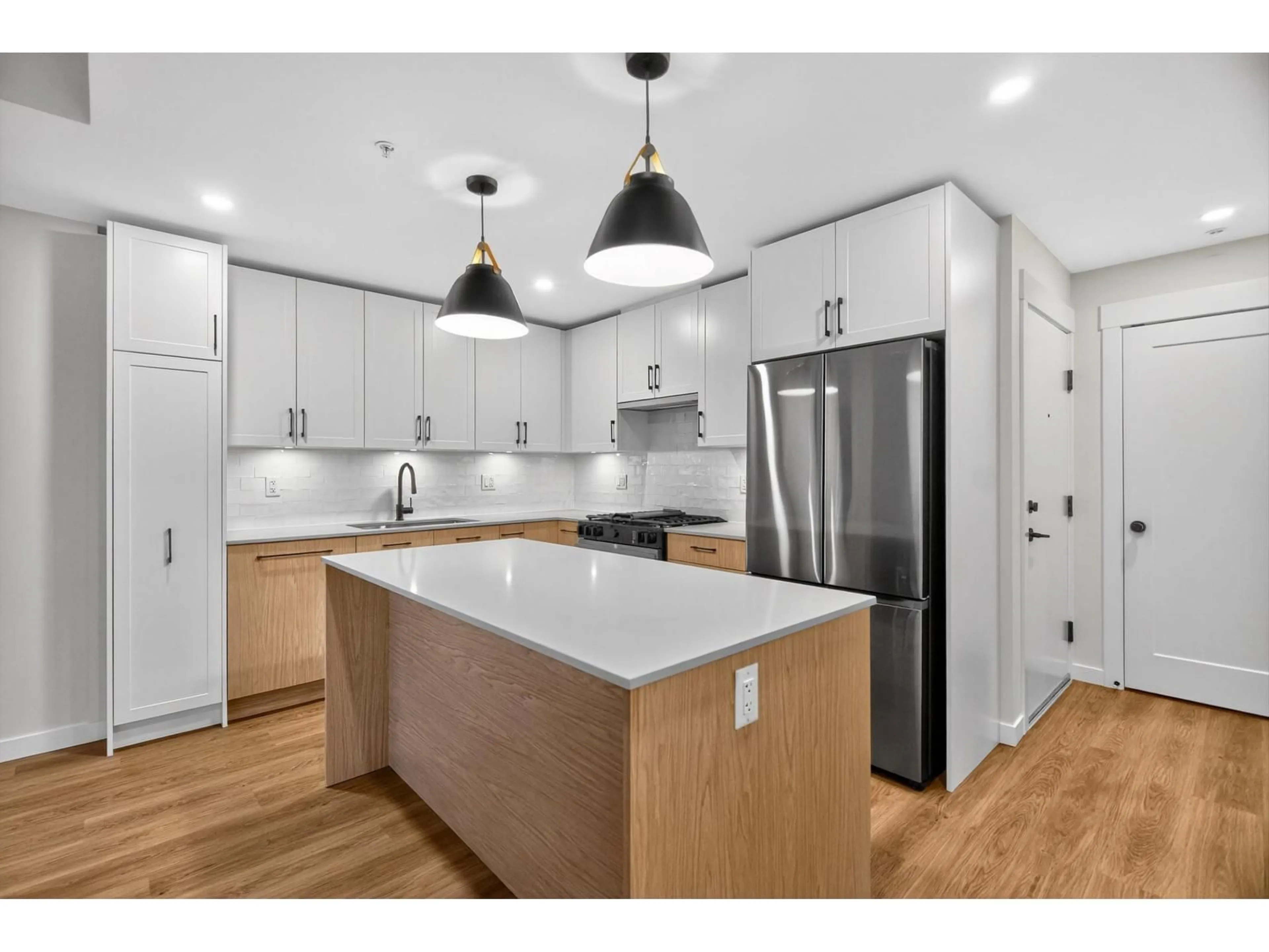 Open concept kitchen, unknown for 210 - 27249 ALDERGROVE TOWN CENTRE DRIVE, Langley British Columbia V4W0E6