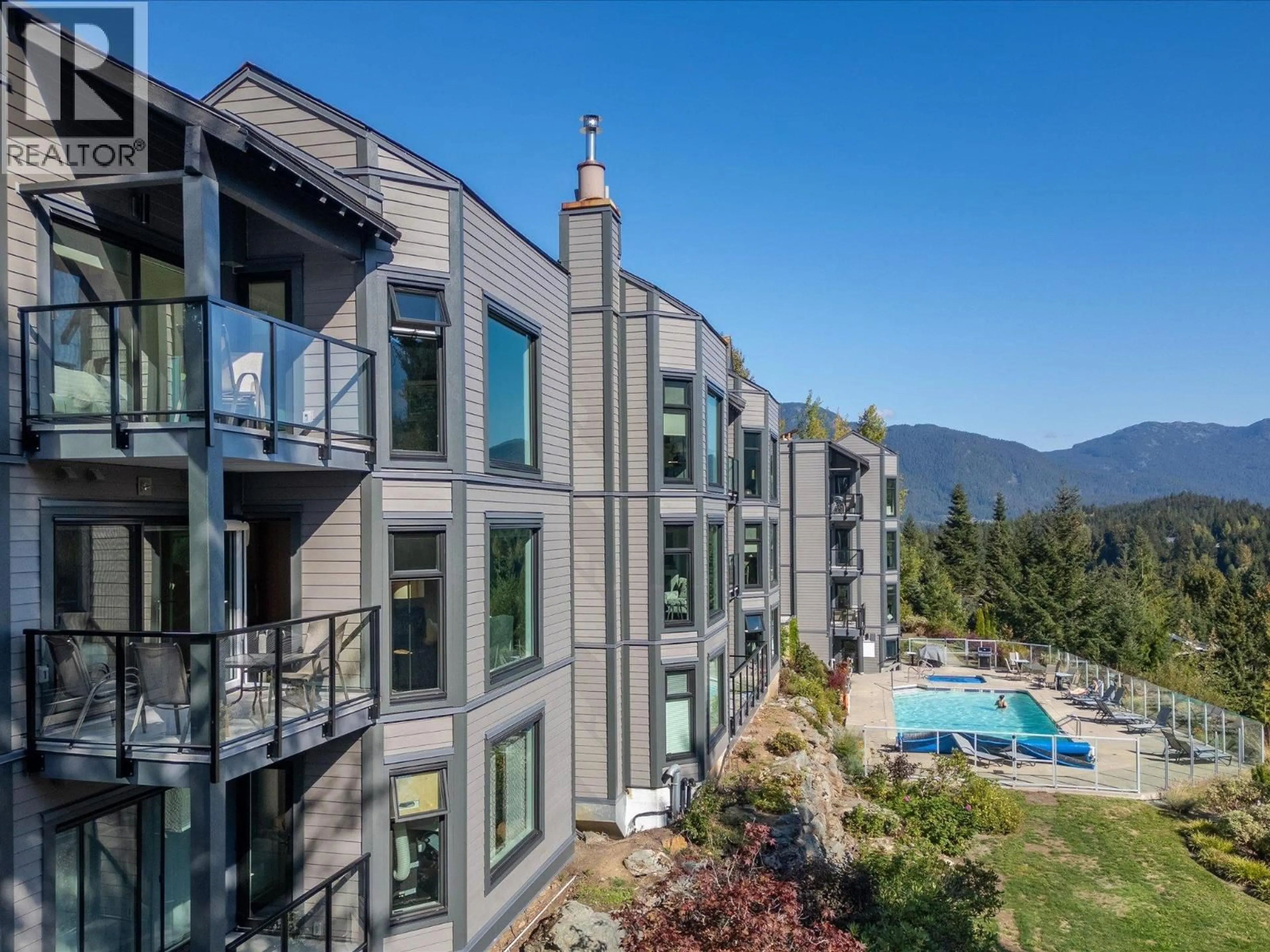 A pic from outside/outdoor area/front of a property/back of a property/a pic from drone, mountain view for 105 - 3217 BLUEBERRY DRIVE, Whistler British Columbia V8E0B8