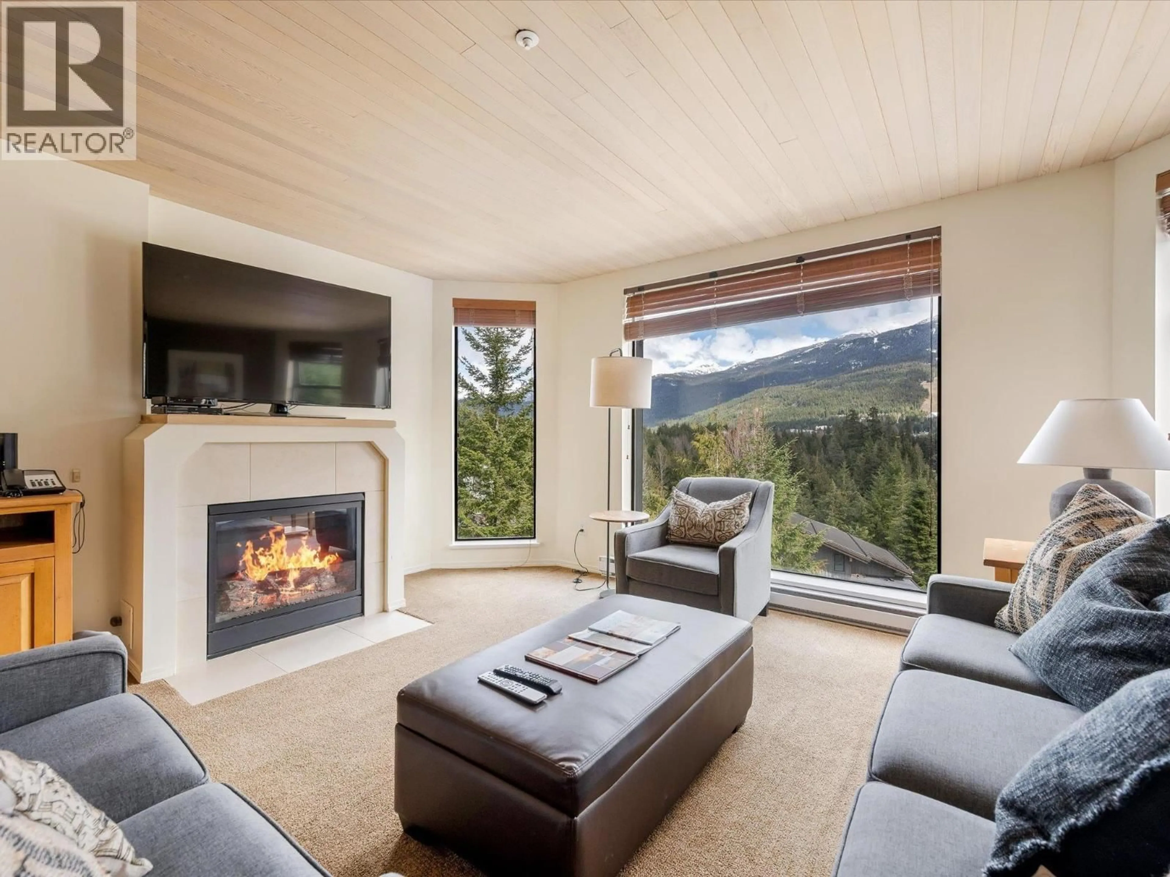 Living room with furniture, unknown for 105 - 3217 BLUEBERRY DRIVE, Whistler British Columbia V8E0B8