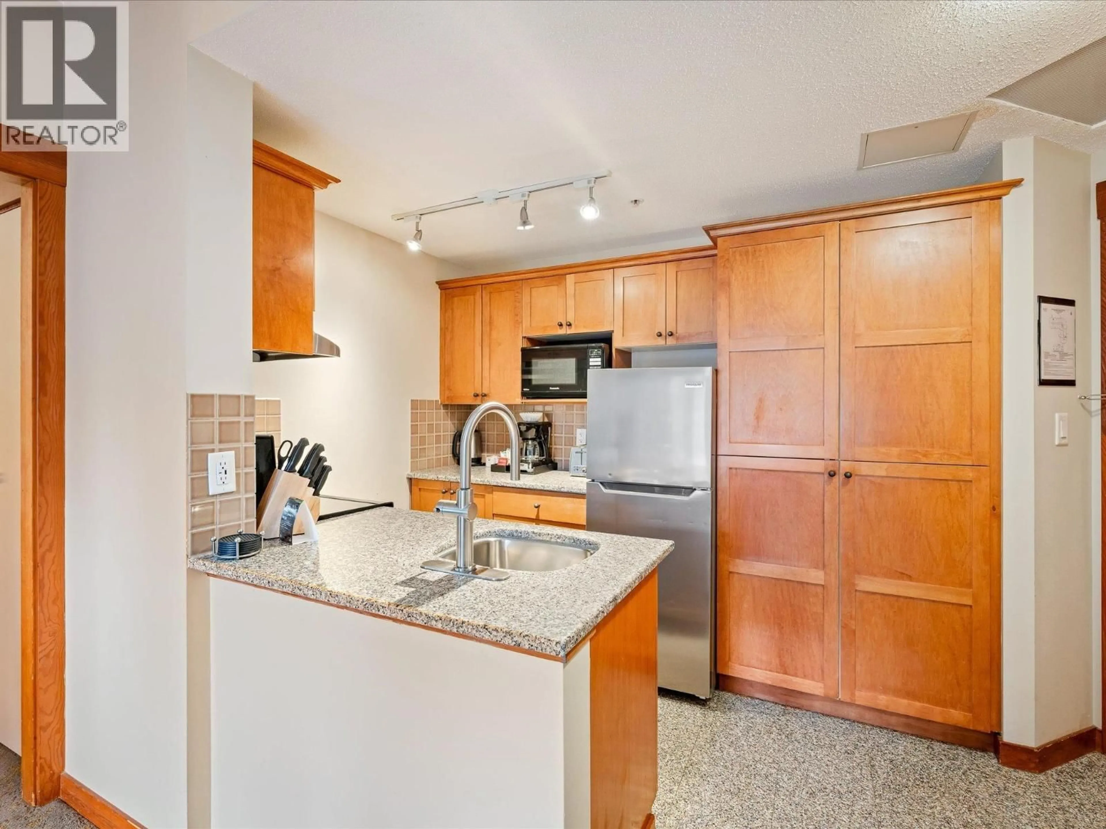 Standard kitchen, ceramic/tile floor for 216 - 4320 SUNDIAL CRESCENT, Whistler British Columbia V8E1G6