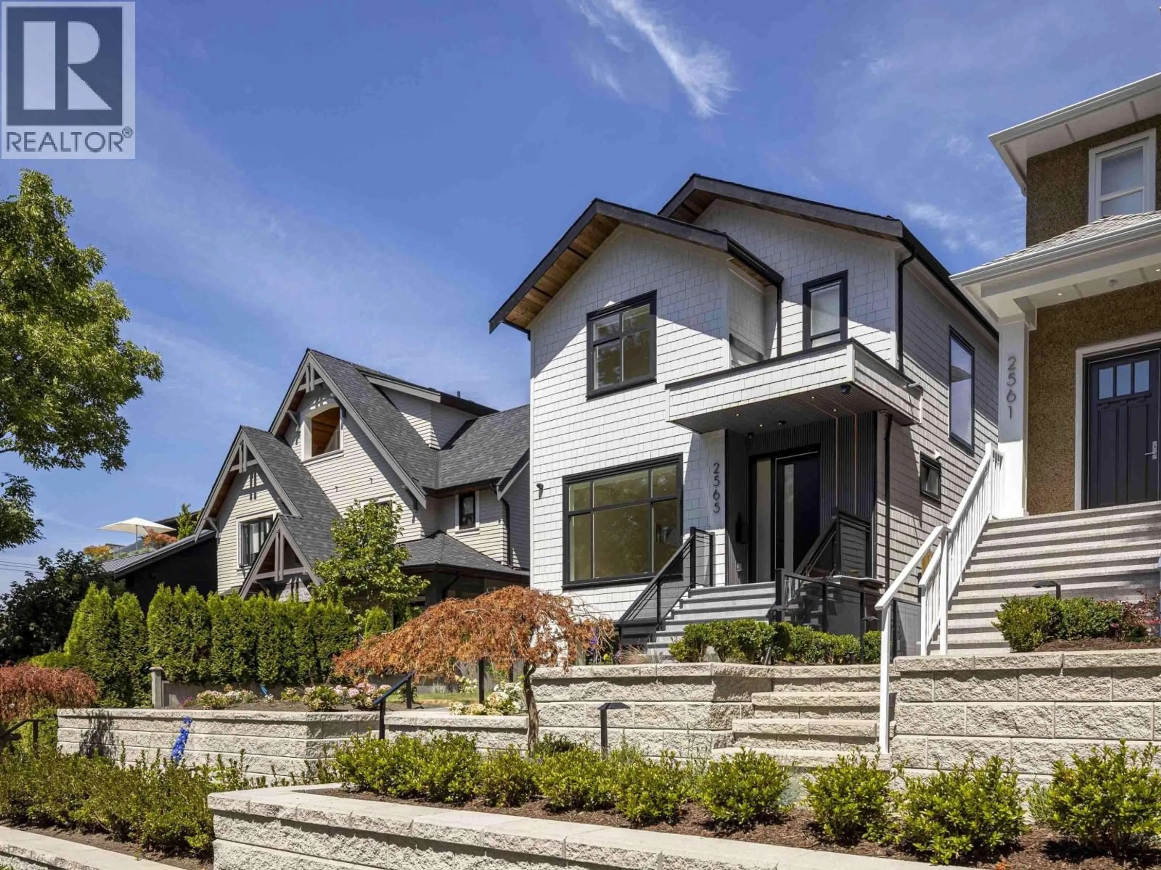 Home with brick exterior material, street for 2565 2ND AVENUE, Vancouver British Columbia V6K1J7