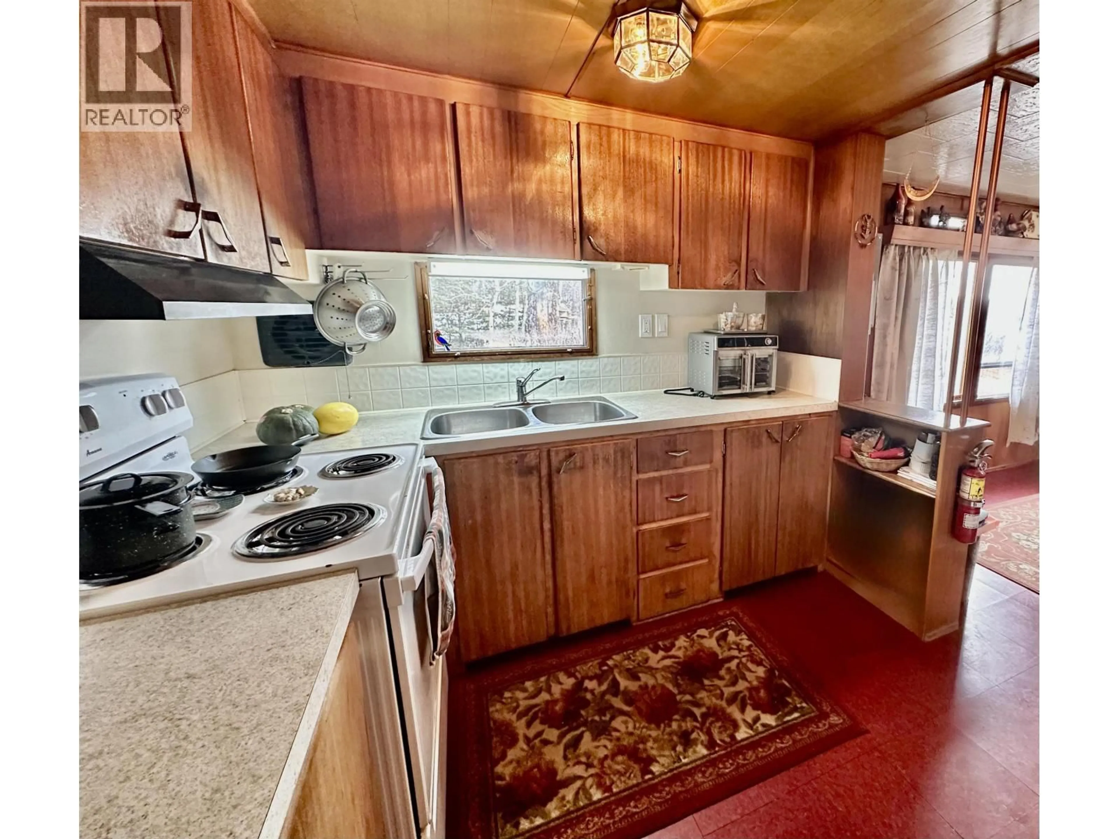 Standard kitchen, unknown for 6808 STOKES ROAD, 100 Mile House British Columbia V0K2E2