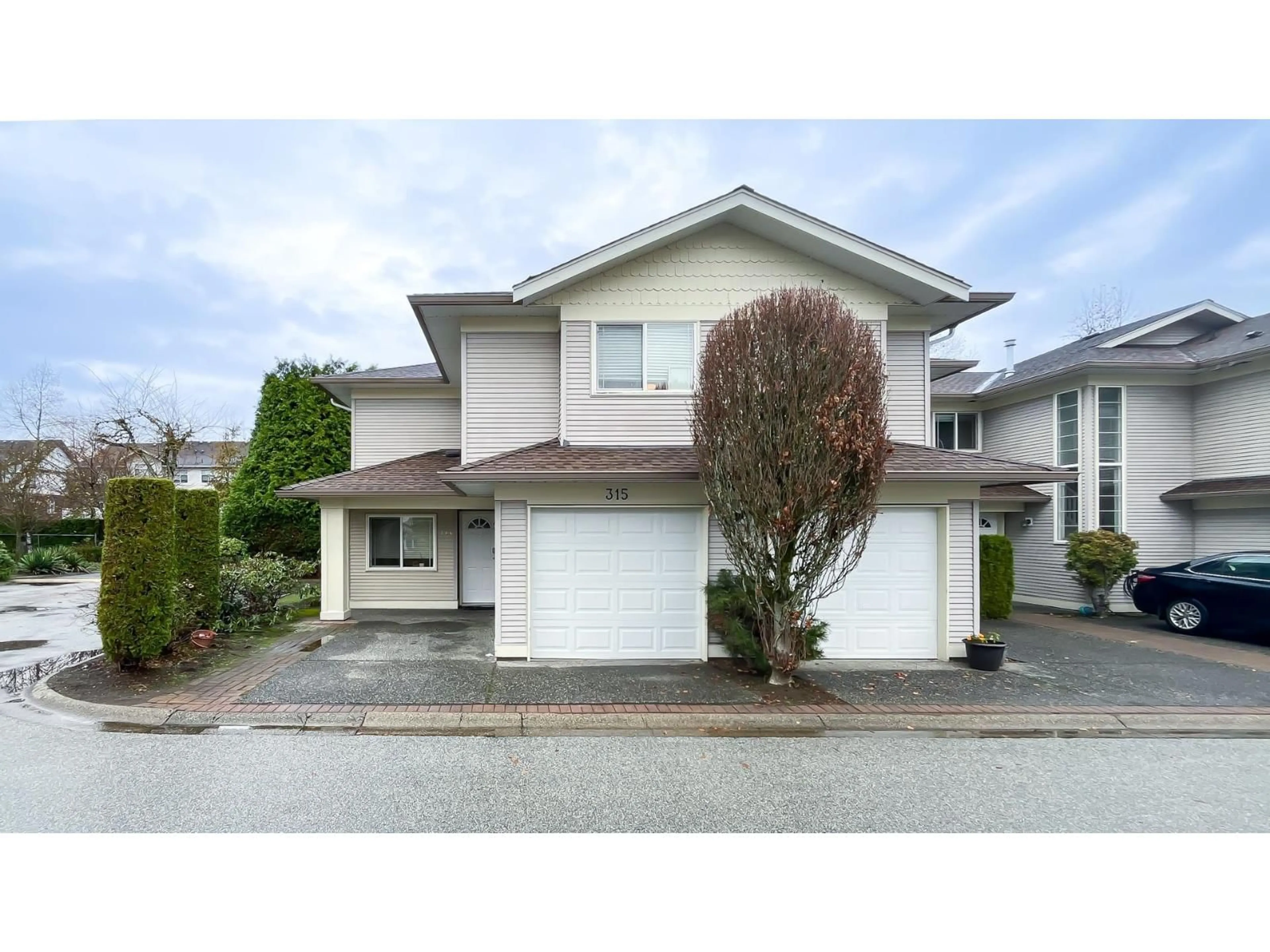Home with vinyl exterior material, street for 315 - 16233 82 AVENUE, Surrey British Columbia V4N0P7