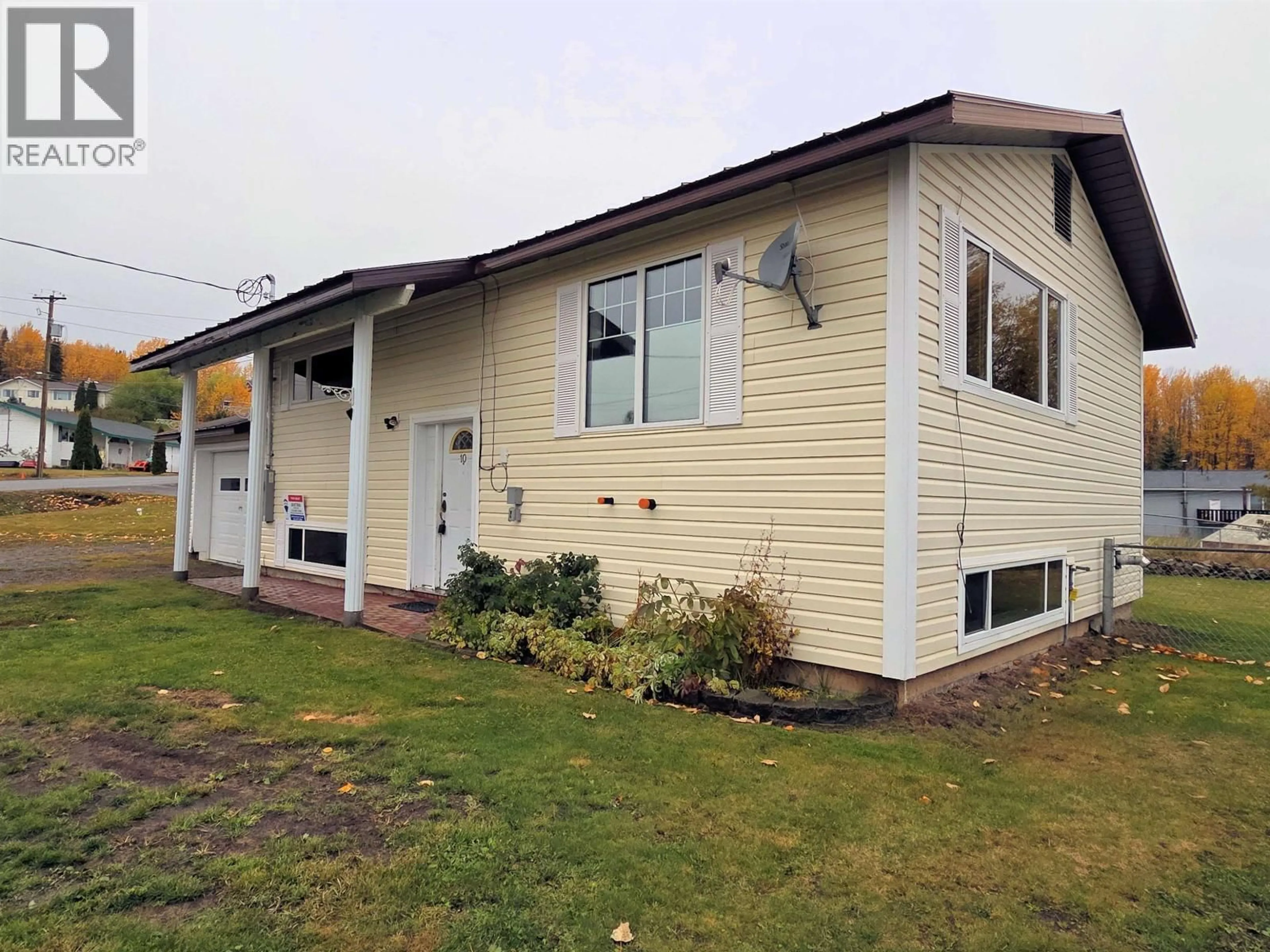 Home with vinyl exterior material, street for 10 MCDONALD AVENUE, Granisle British Columbia V0J1W0