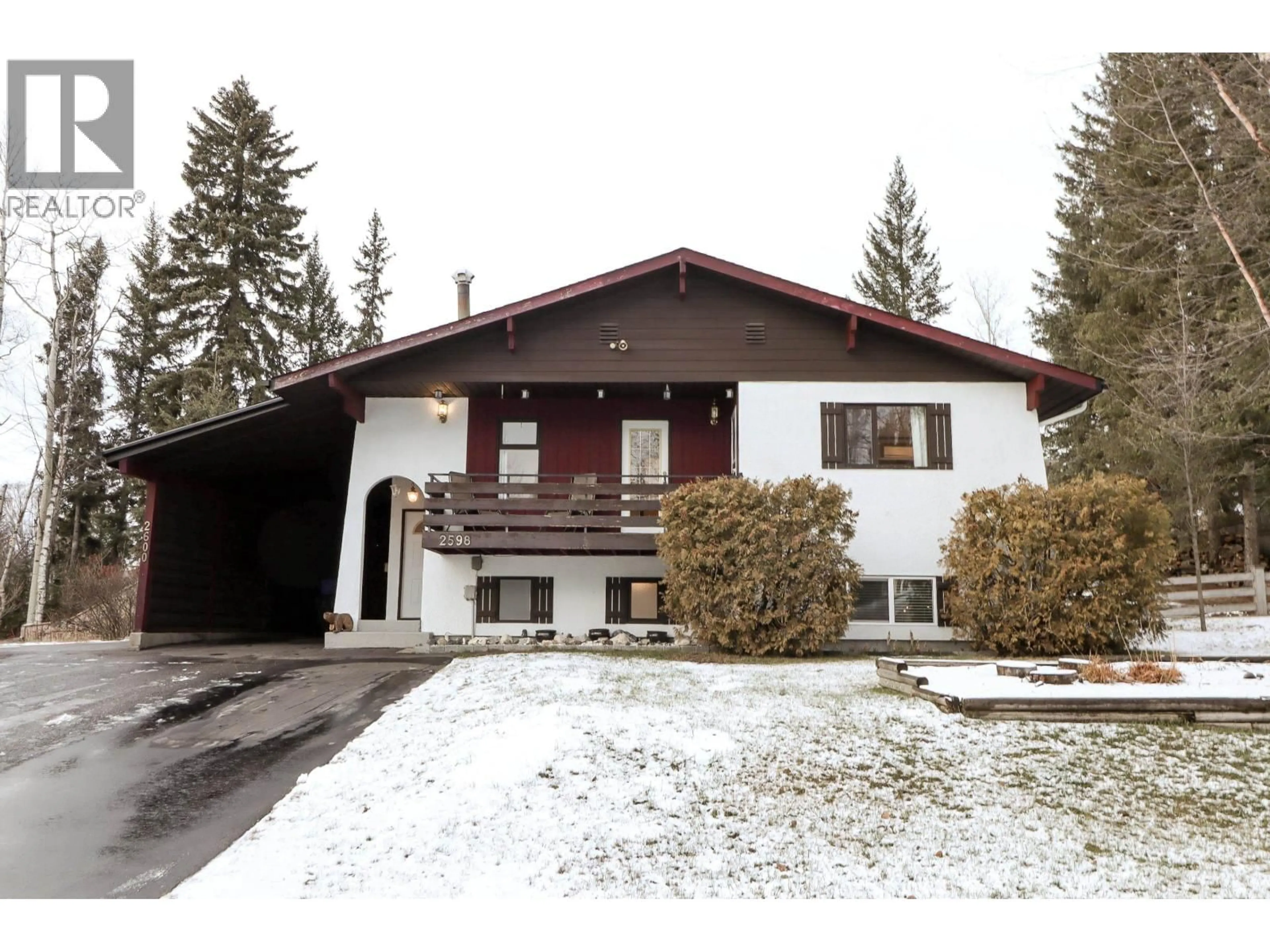 Home with vinyl exterior material, street for 2598 MCGILL CRESCENT, Prince George British Columbia V2N1Z6