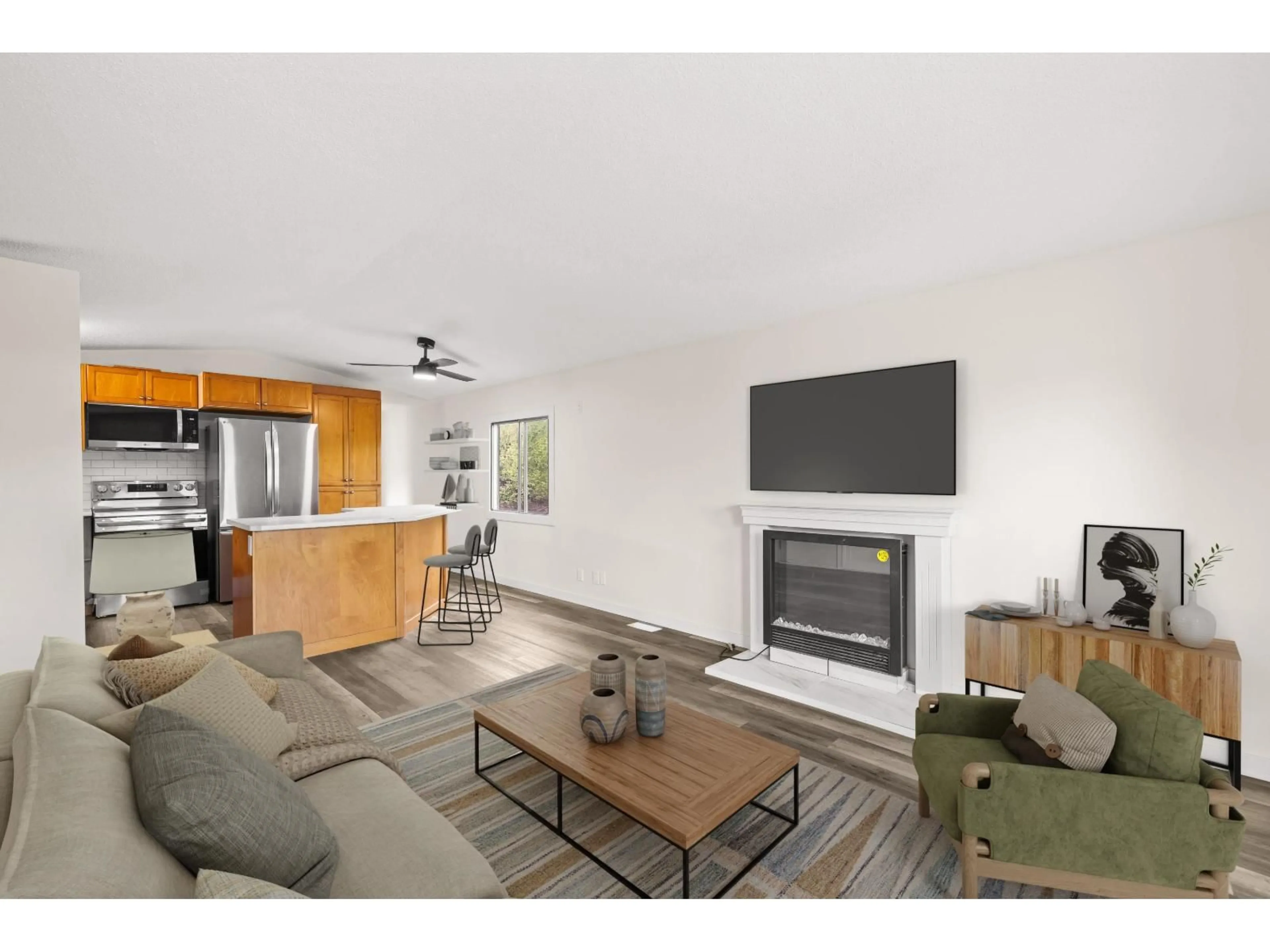 Living room with furniture, wood/laminate floor for 1 - 7610 EVANS ROAD, Chilliwack British Columbia V2R2T4