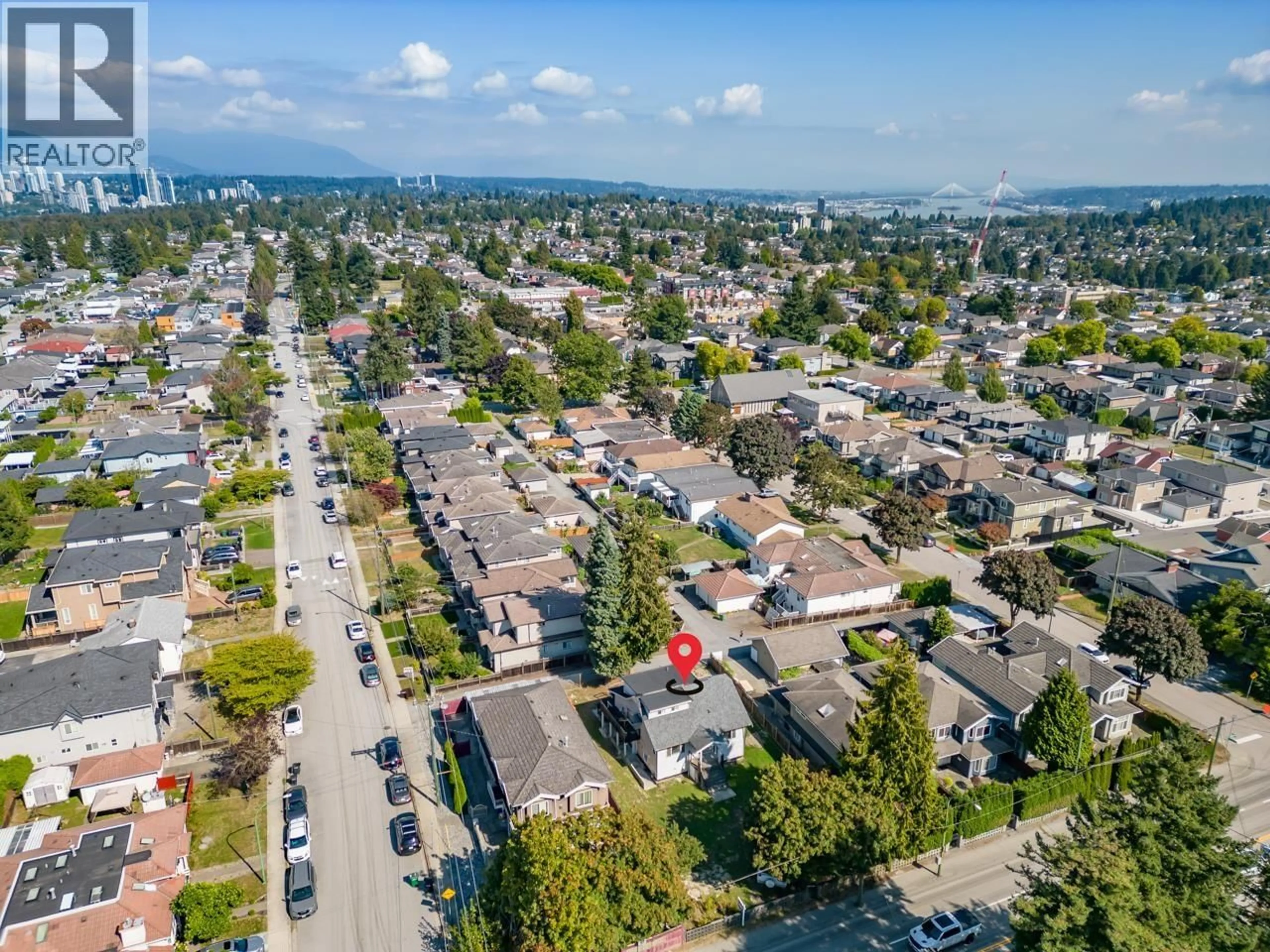 A pic from outside/outdoor area/front of a property/back of a property/a pic from drone, street for 7520 CANADA WAY, Burnaby British Columbia V3N3K2
