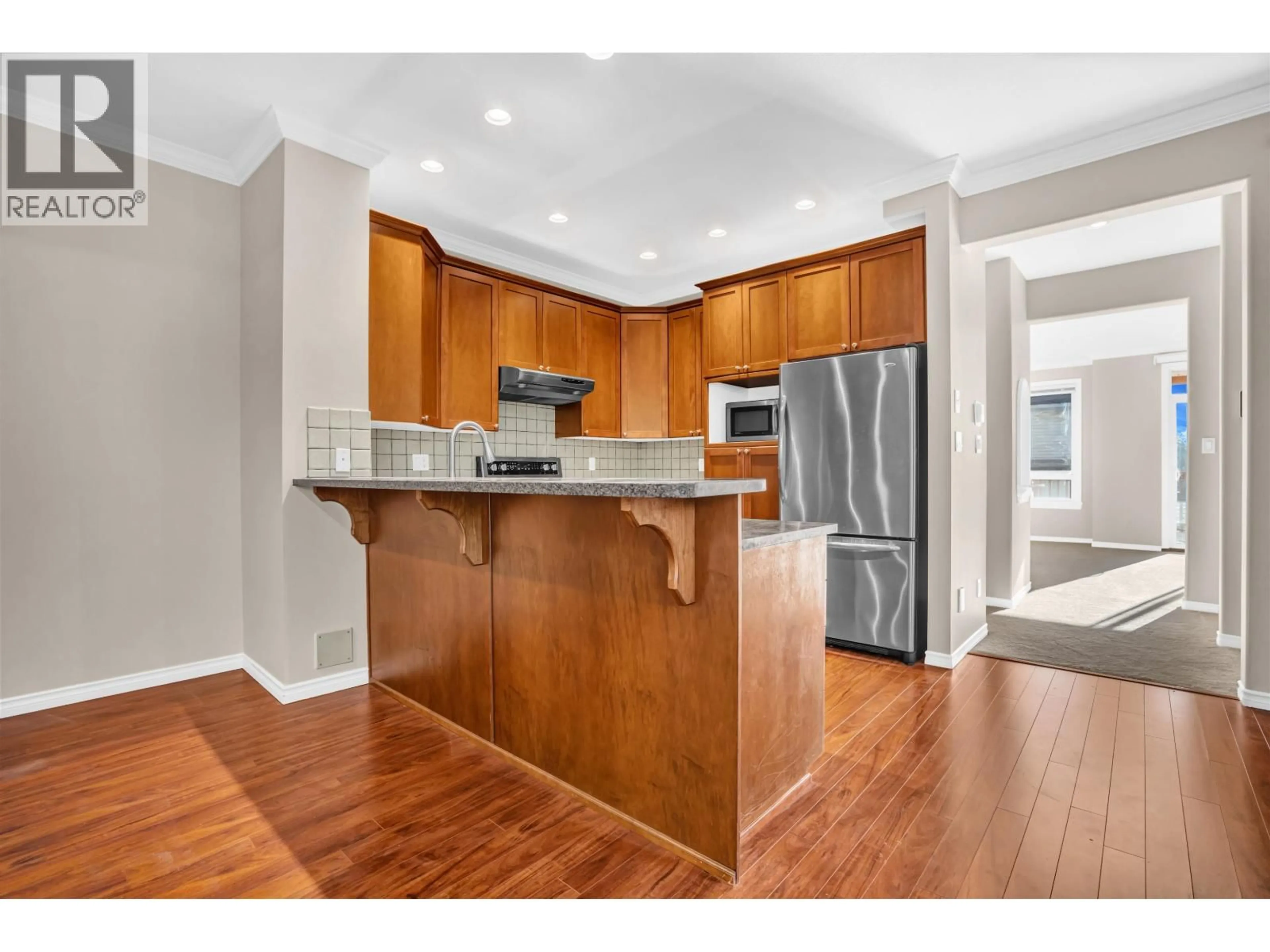 Open concept kitchen, wood/laminate floor for 10 - 2381 ARGUE STREET, Port Coquitlam British Columbia V3C6P9