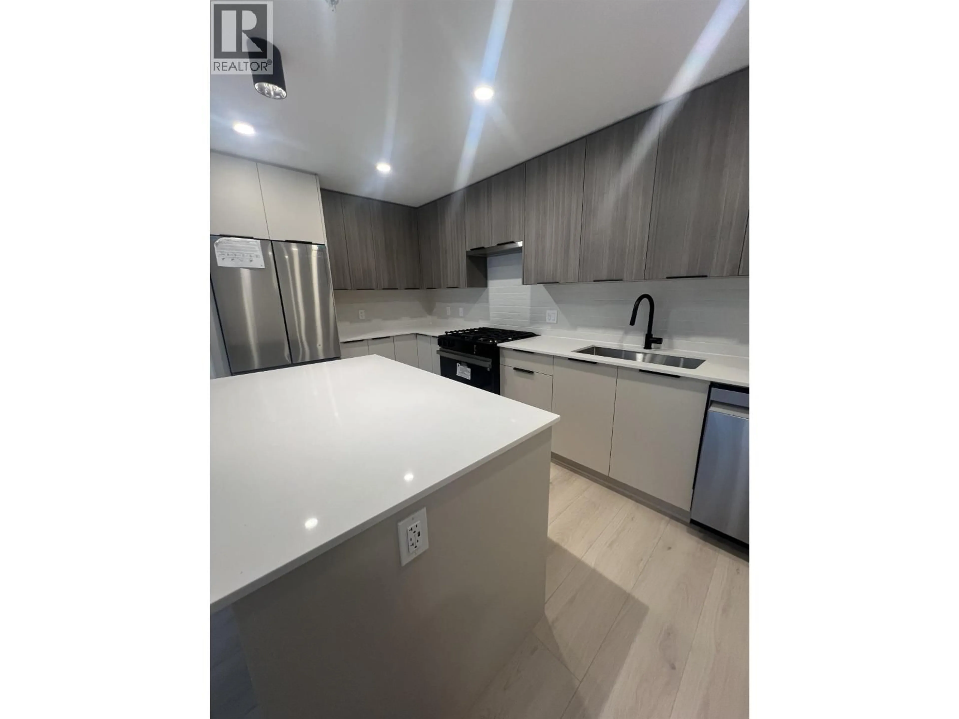 Open concept kitchen, unknown for 102 - 111 BULLER STREET, Port Moody British Columbia V3H0J7