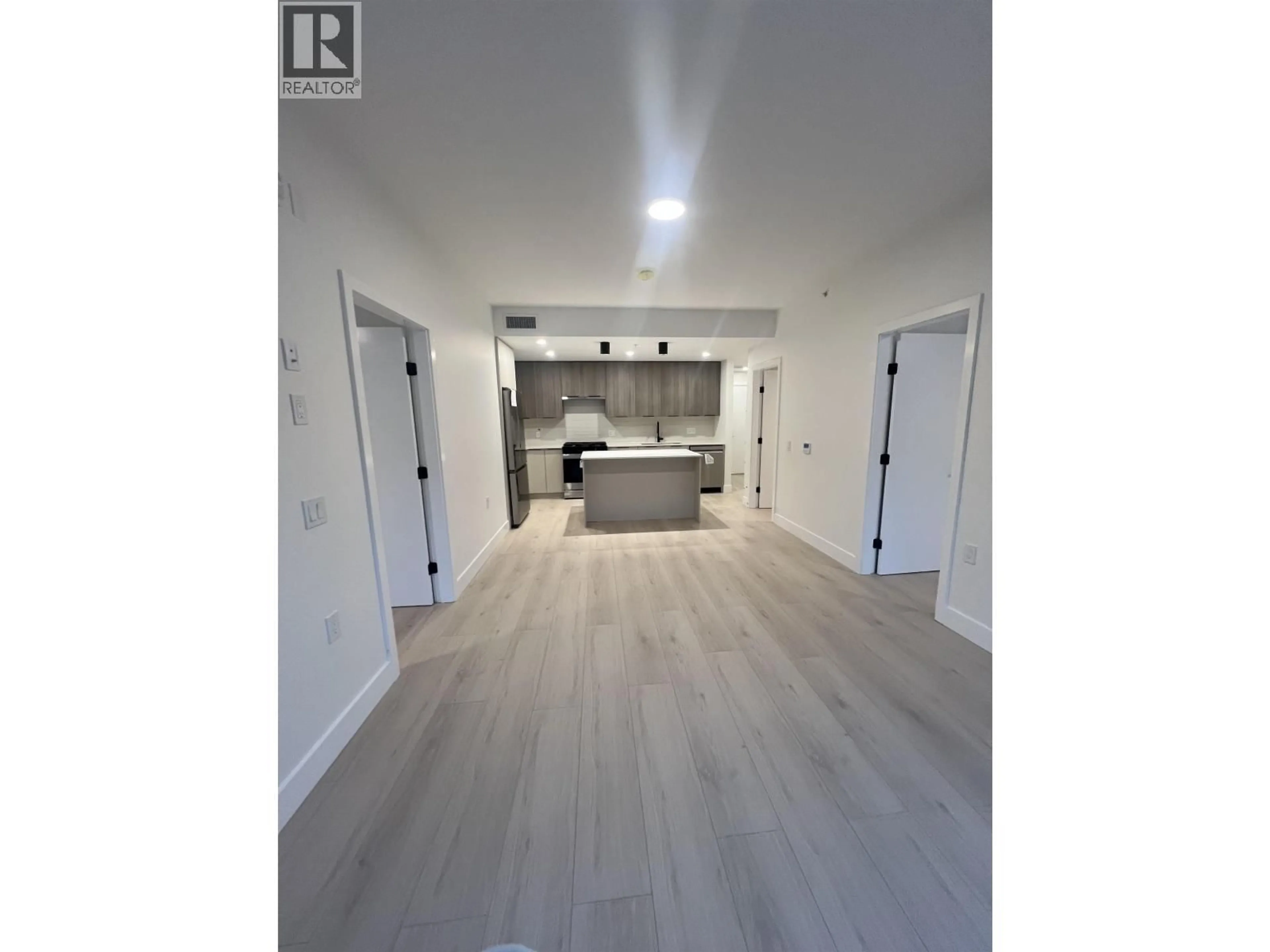 Open concept kitchen, unknown for 102 - 111 BULLER STREET, Port Moody British Columbia V3H0J7